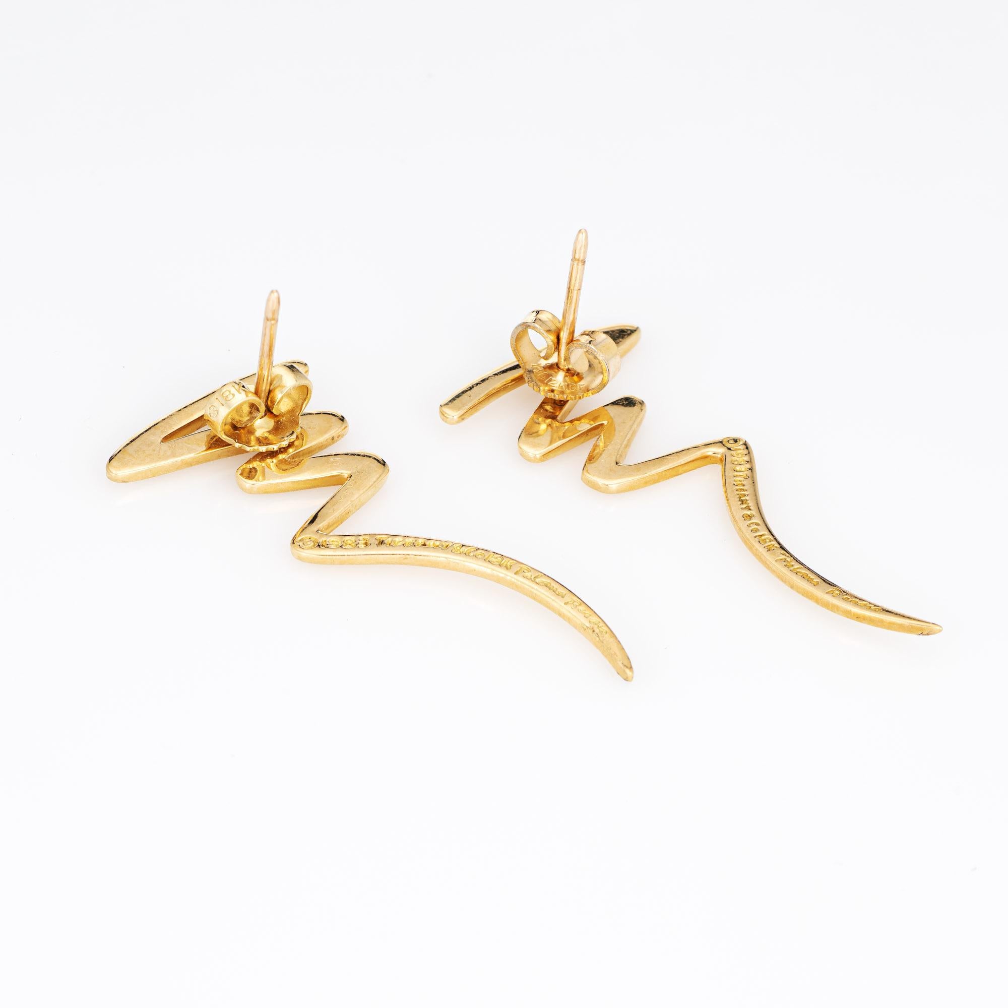 Elegant pair of vintage Tiffany & Co 'zig zag' earrings (circa 1983) crafted in 18k yellow gold. 

The earrings are designed by Paloma Picasso for Tiffany & Co, dating to 1983. The distinct design is timeless and great for day or evening wear. The