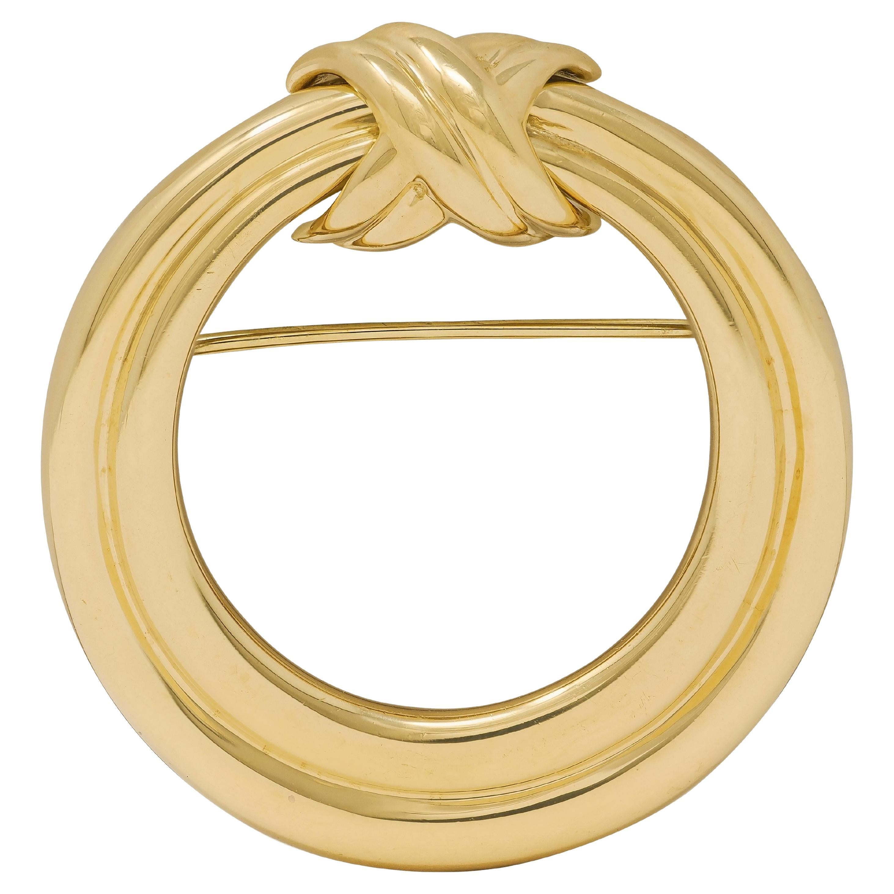 Tiffany 
Co. 1990, oro giallo 18 carati, spilla vintage a forma di cerchio annodato