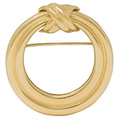 Tiffany 
Co. 1990, oro giallo 18 carati, spilla vintage a forma di cerchio annodato