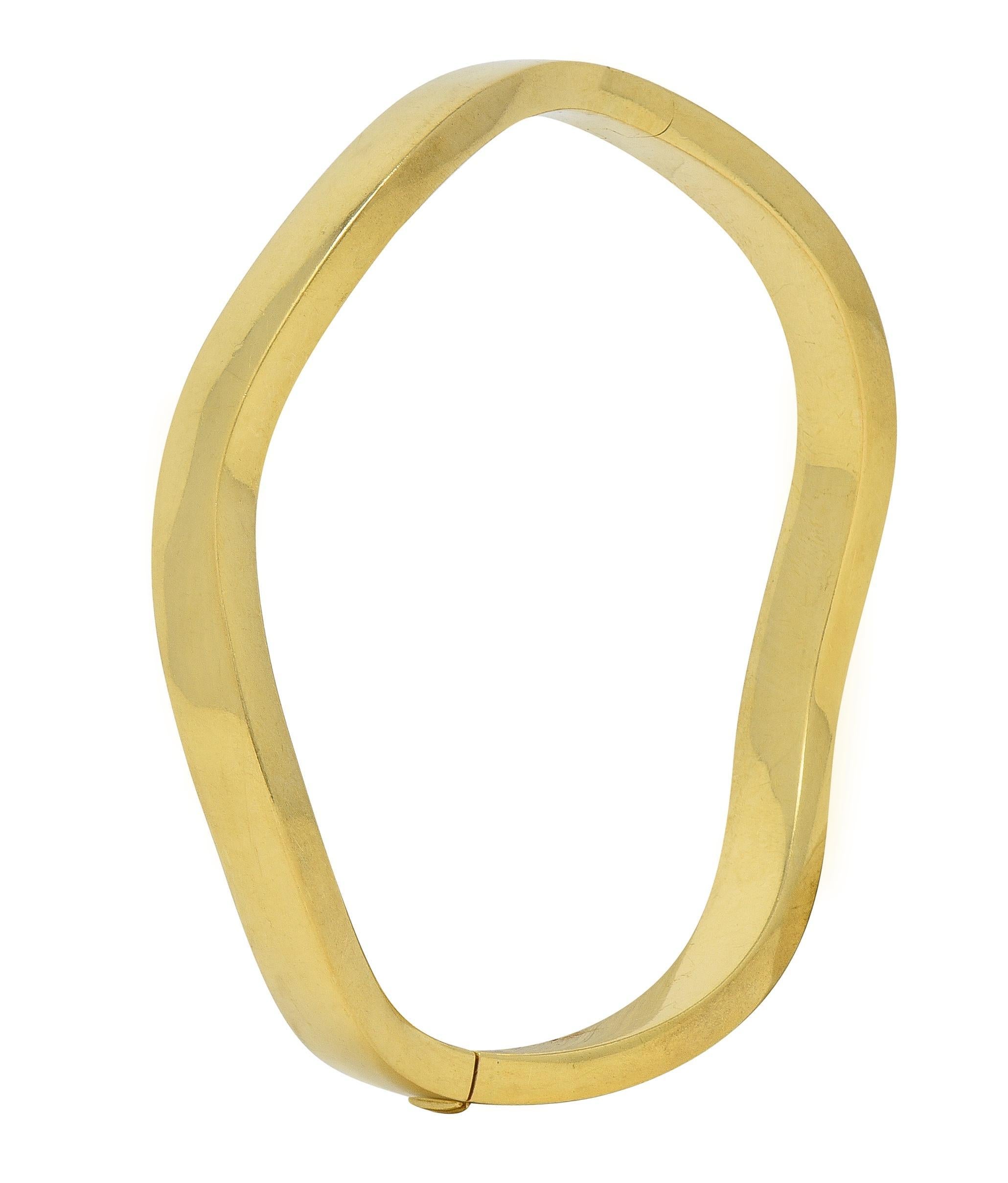 Tiffany & Co. 1990's 18 Karat Yellow Gold Vintage Wave Bangle Bracelet In Excellent Condition For Sale In Philadelphia, PA