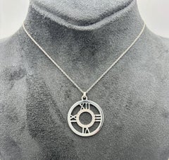 Tiffany & Co 1990's 18k white gold and diamond Atlas pendant