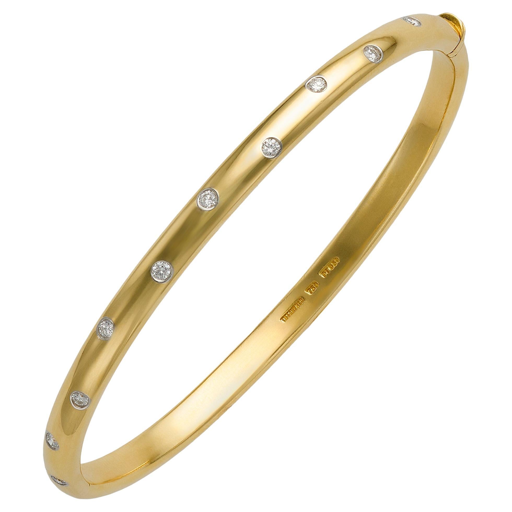 Tiffany & Co. 1990s 18k Yellow Gold Diamond Etoile Bangle