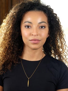 Tiffany & Co. 1990's 18K Yellow Gold Vintage Minimalist Feather Pendant Necklace