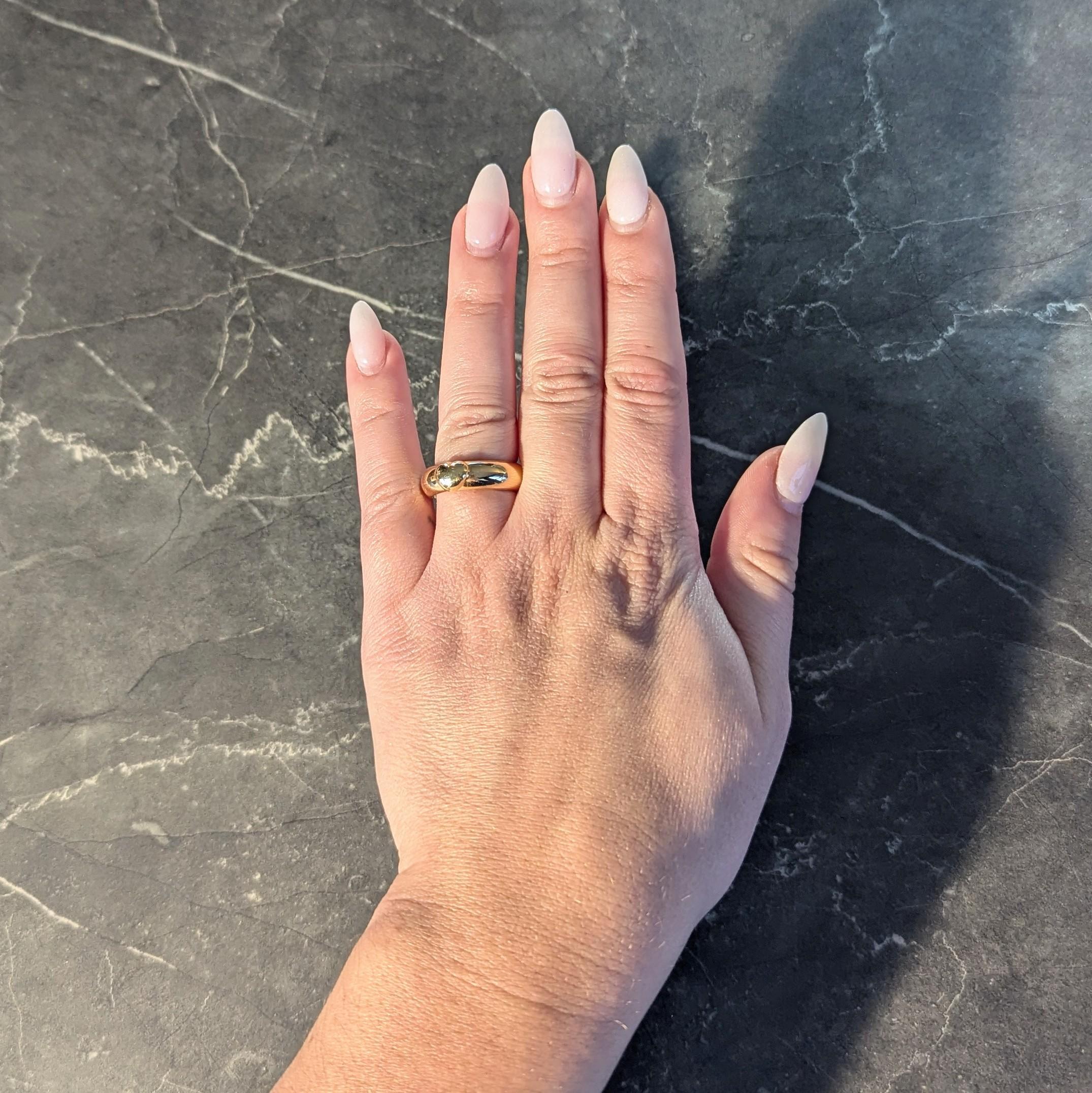 Designed as a puffy-style rose gold band
Featuring a yellow gold heart appliqué
With high polish finish
Stamped for 18 karat gold
Fully signed for Tiffany & Co.
Circa: 1993; via dated stamp and form the Friendship Collection
Ring Size: 5 1/2 and not