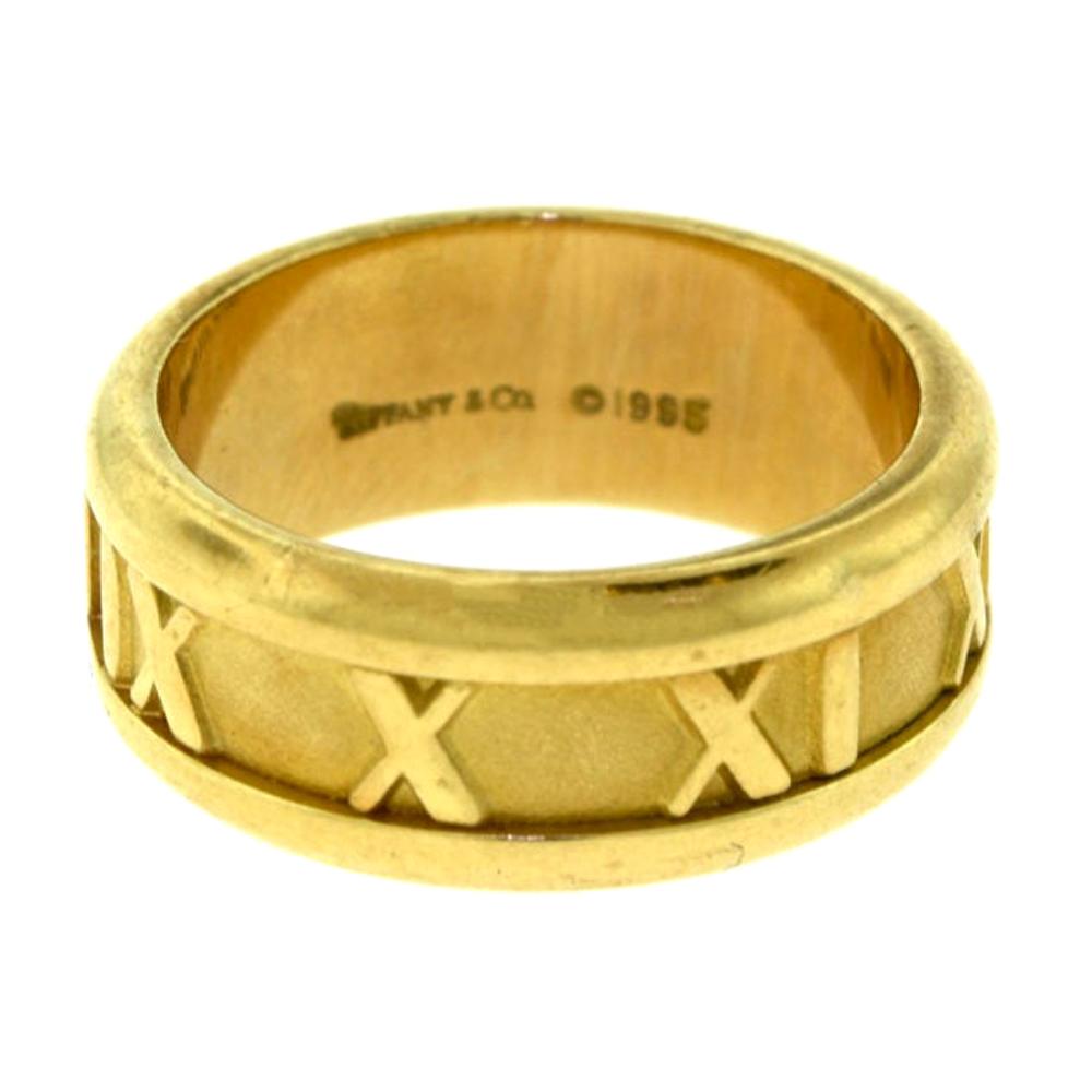 tiffany ring with roman numerals on it