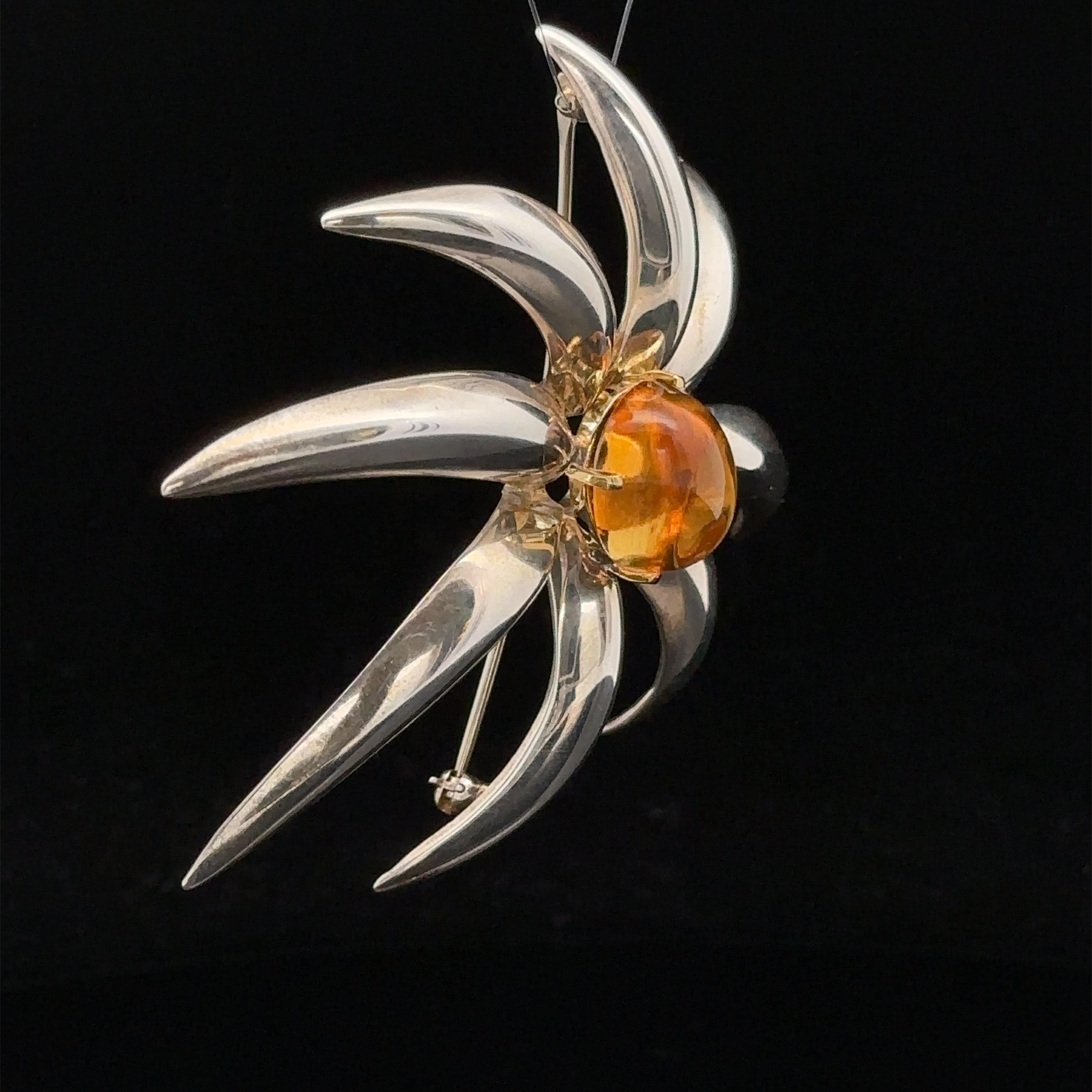 –Stone(s)–
(1) Natural Genuine Citrine - Oval Cabochon - Prong Set - Rich Yellow Color - 16.23 x 12.18mm (approx.)
Material: Sterling Silver .925 - 18k Yellow Gold Setting
Weight: 29.04 Grams
Overall Height: 62.92mm (2.47