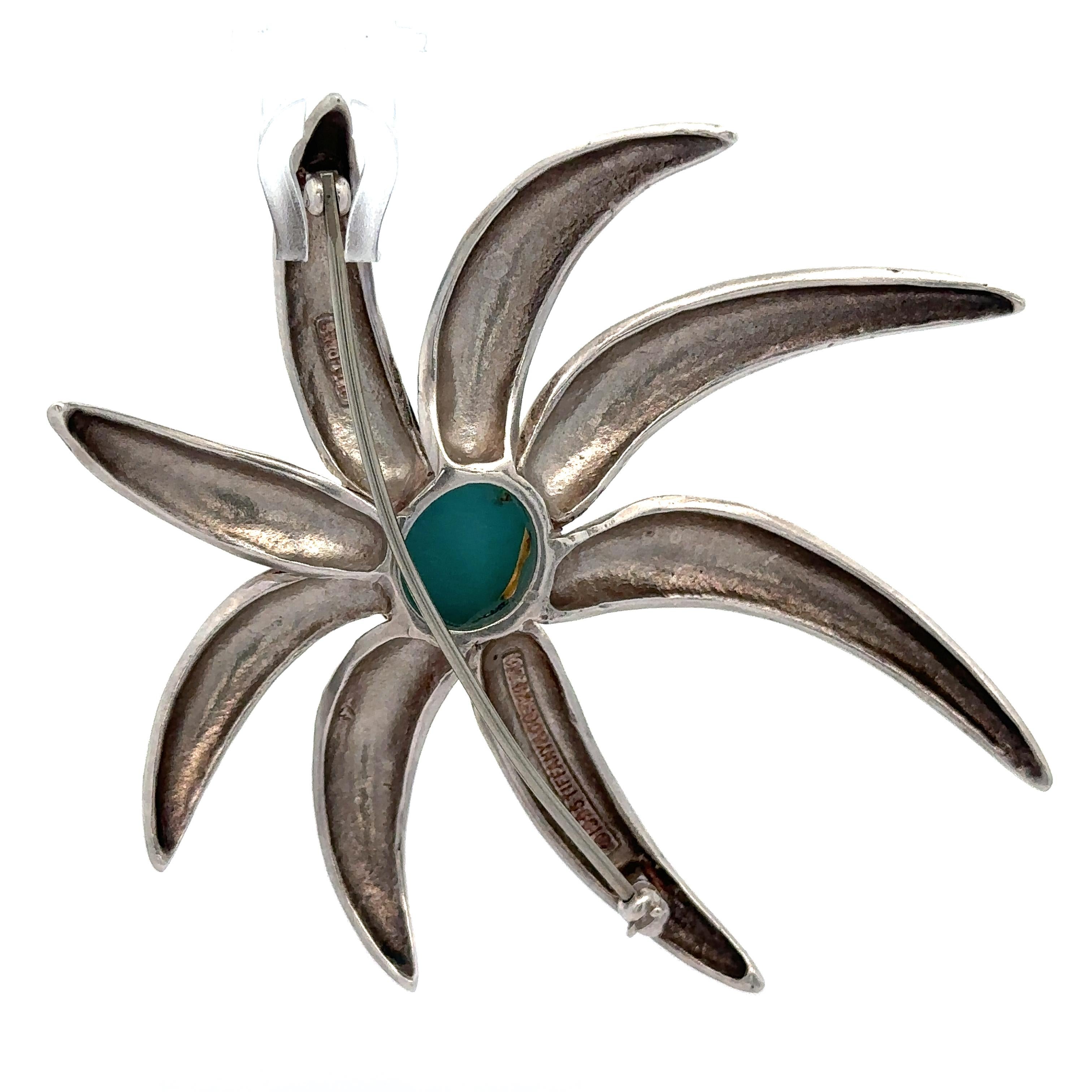–Stone(s)–
(1) Natural Genuine Turquoise - Oval Cabochon - Prong Set - Robins Egg Blue Color - 16 x 12mm (approx.)
Material: Sterling Silver .925 - 18k Yellow Gold Setting
Weight: 29 Grams
Overall Height: 67mm (2.6