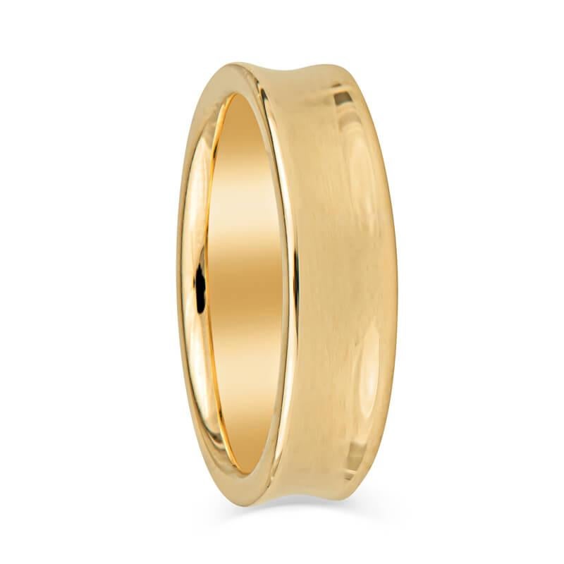 A high polished wedding band crafted from 18 karat yellow gold and features a recessed central groove. The 1997 Tiffany & Co. hallmark can be seen on the inside of the ring. This is a size 8.75.
Condition: Excellent. No visible signs of wear.