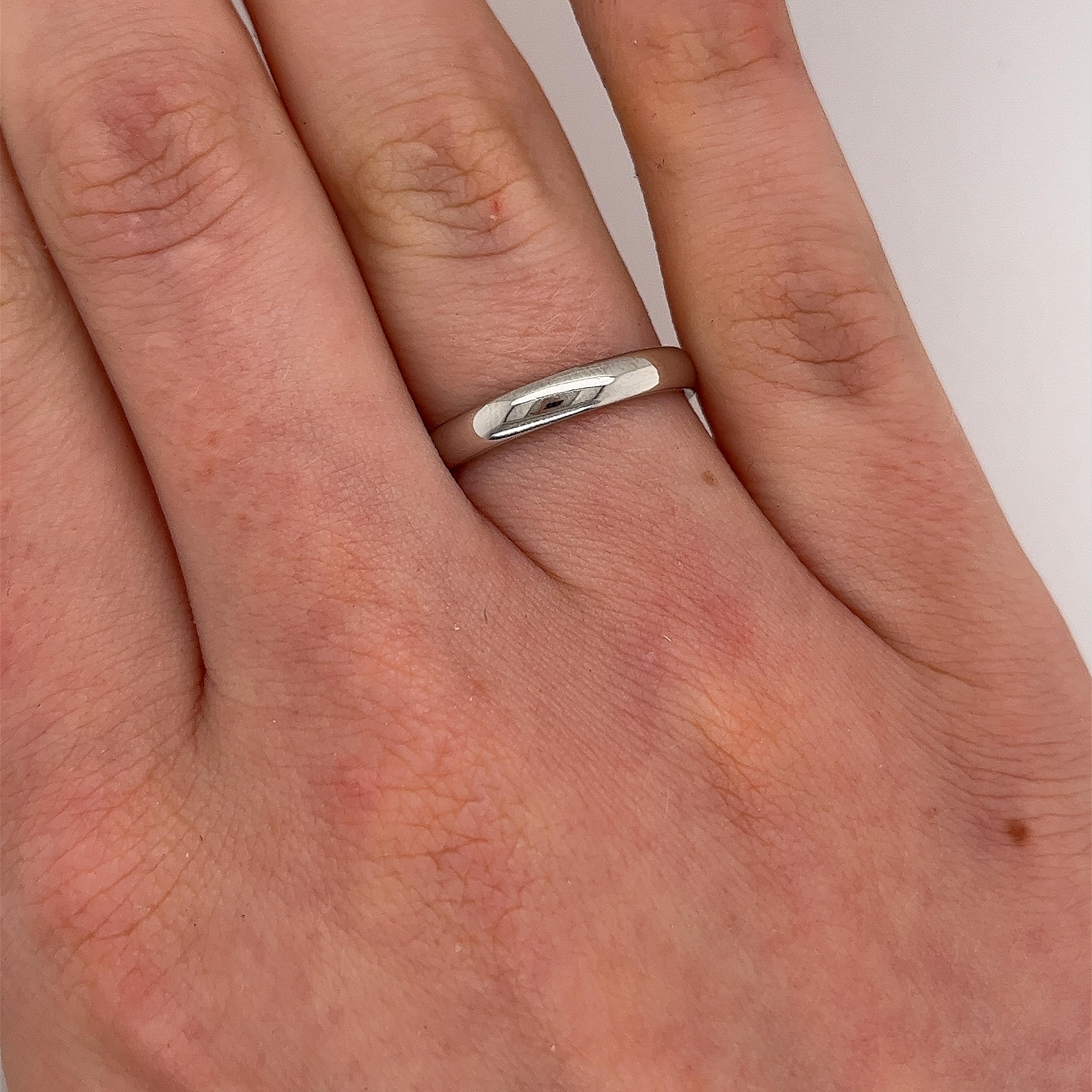 Exuding elegance and sophistication, 
the Tiffany & Co. Band Ring in platinum is a stunning statement piece.

Width of Band: 3mm
Depth of Band: 1.52mm
Total  Weight: 4.93g
Ring Size: N

SMS9298

