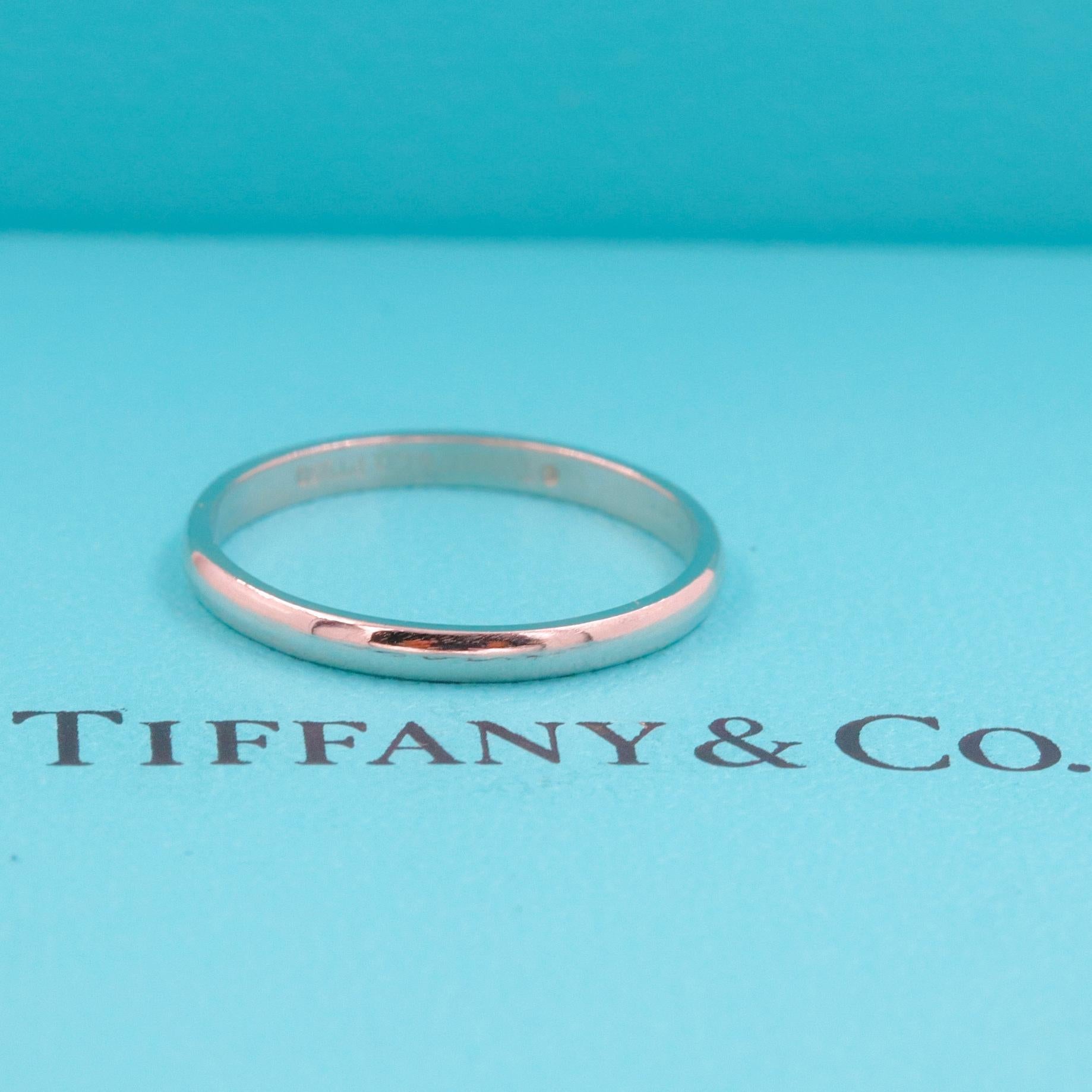 TIFFANY & CO Classic Wedding Band Ring

Style:  2 MM
Metal:  Platinum PT950
Size:  5 - sizable
Width:  2 MM
Hallmark:  ©TIFFANY&CO.PT950
Includes:  T&C Ring Pouch

Retail Value:  $850

SKU#1150TGC050819-5SZ-VV-KK