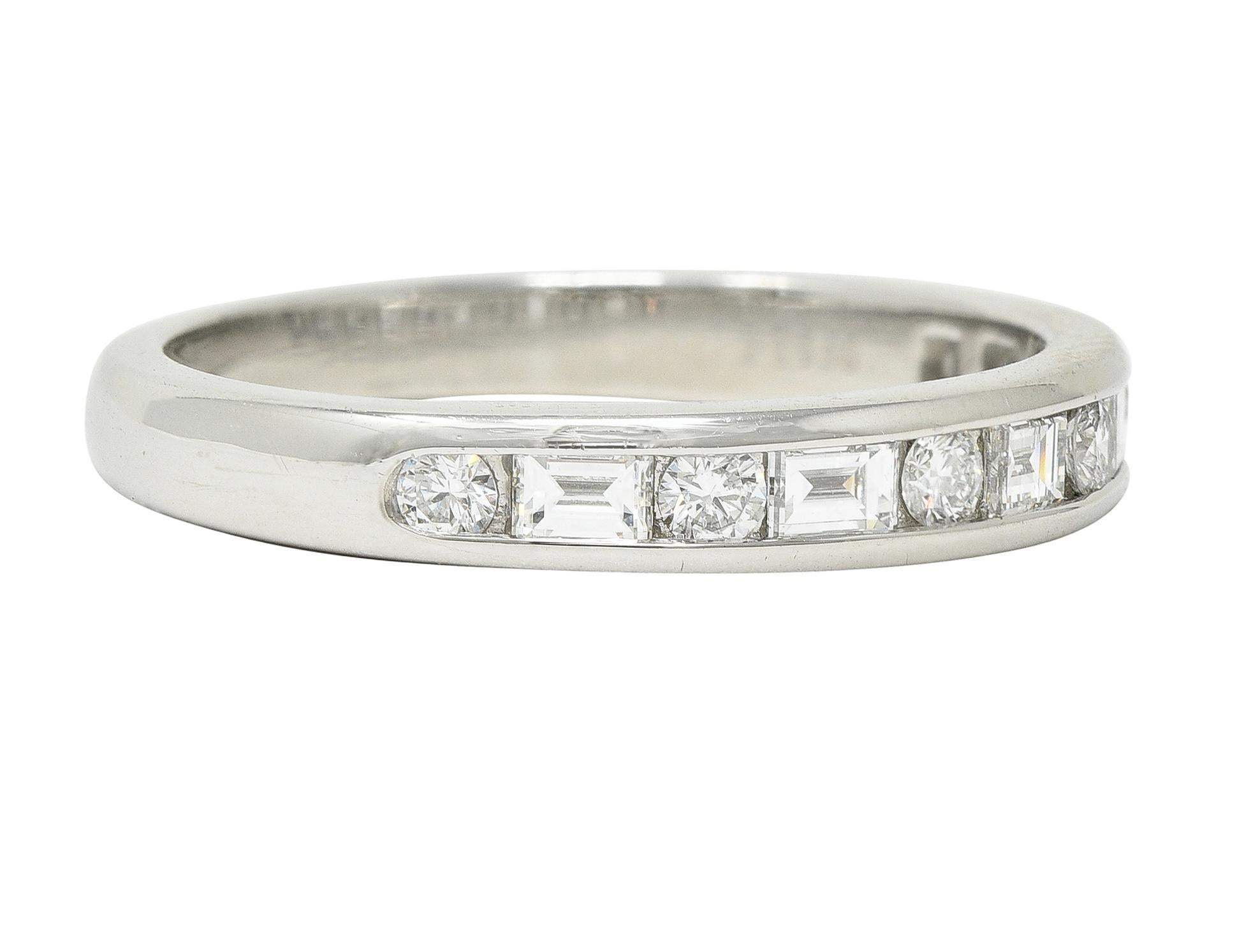 Comprised of round brilliant and baguette cut diamonds alternating in pattern 
Channel set to front and weighing approximately 0.66 carat total 
G color with VS1 clarity
Completed by high polish finish
Stamped for platinum 
Fully signed for Tiffany