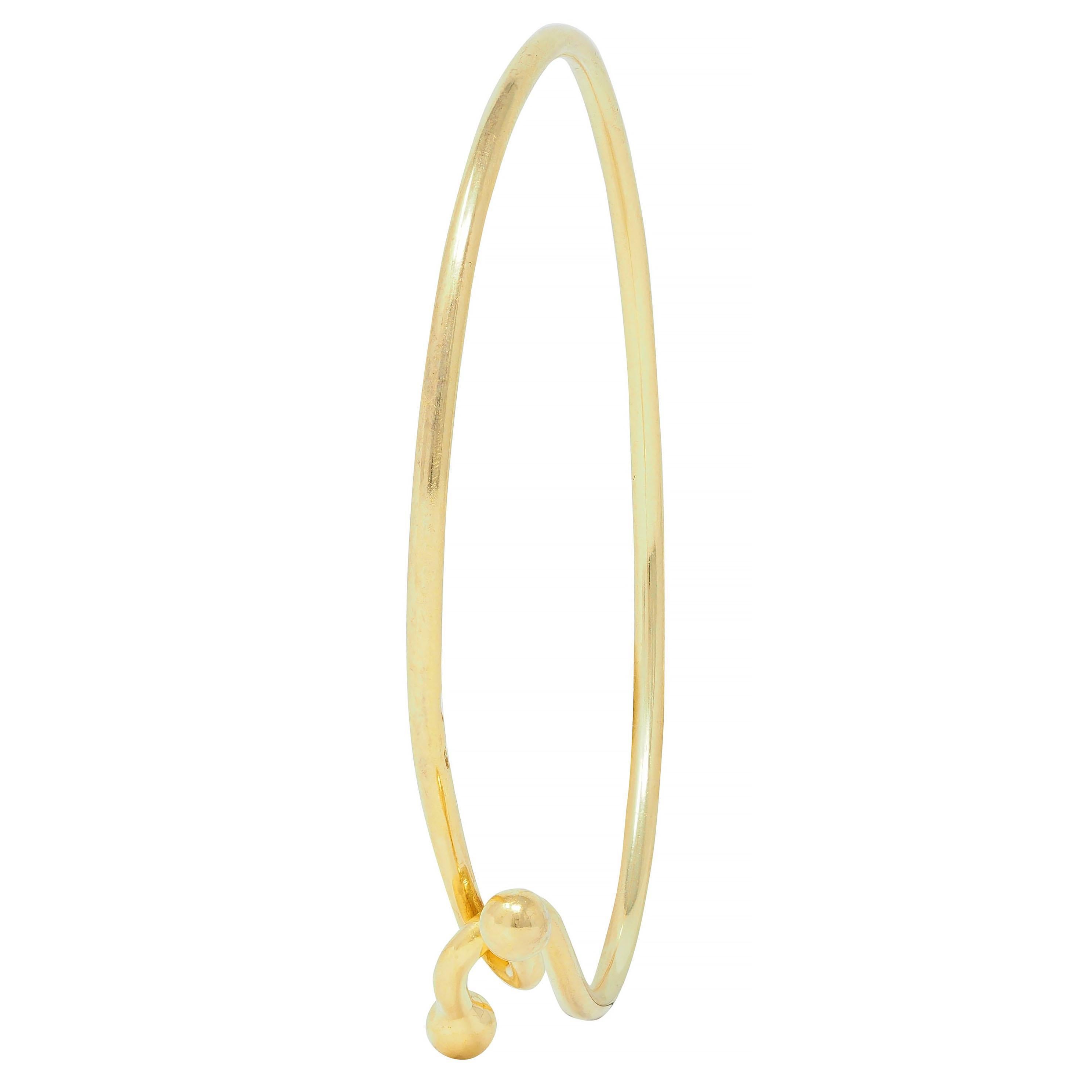 Tiffany & Co. 2000's 18 Karat Yellow Gold Interlocking Hook Bangle Bracelet For Sale 2