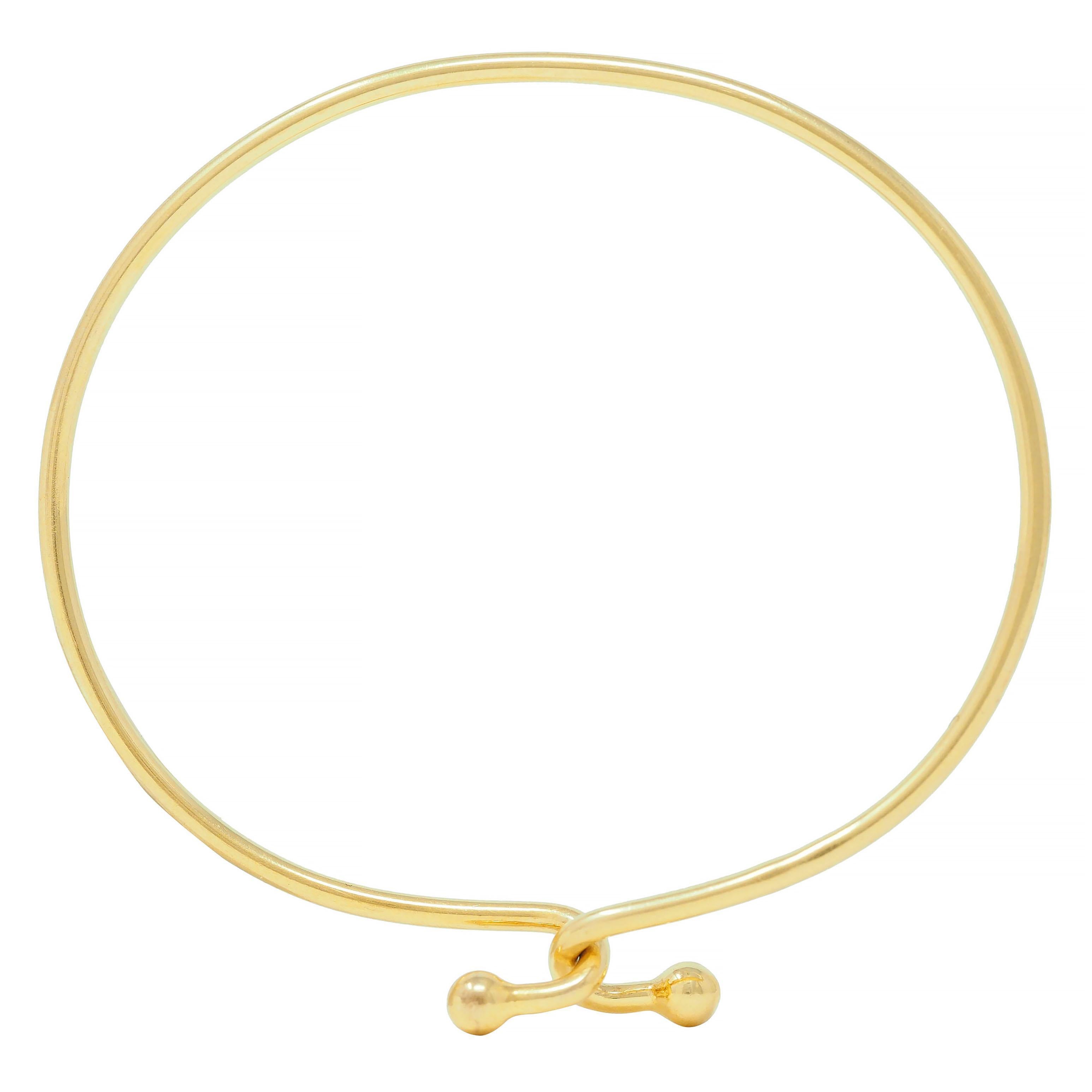 Tiffany & Co. 2000's 18 Karat Yellow Gold Interlocking Hook Bangle Bracelet For Sale 3