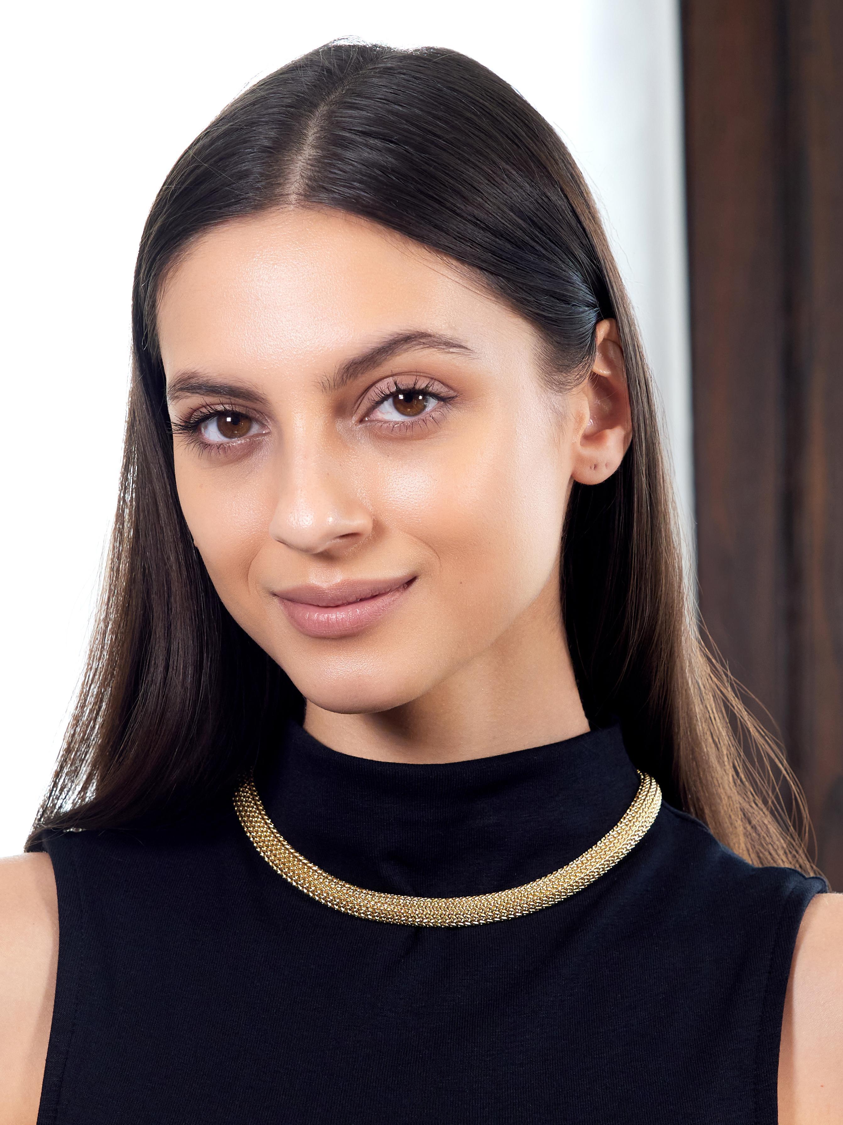 Designed as a slightly rounded graduated collar necklace
Comprised of finely woven gold mesh
Completed by concealed press release closure
With hinged bar safety
Stamped for 18 karat gold
Fully signed for Tiffany & Co.
Circa: 2000s; via the Somerset
