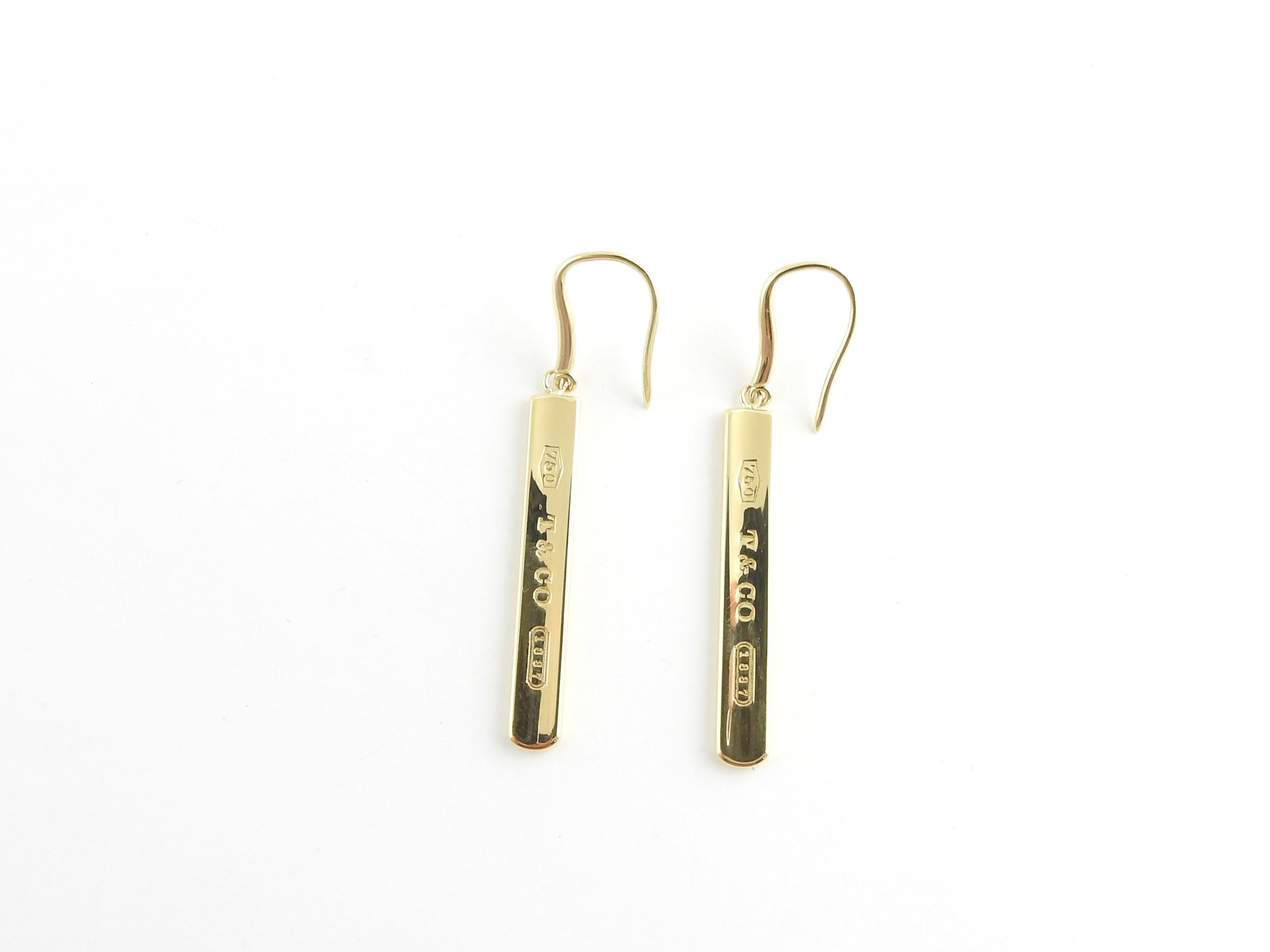 2003 Tiffany & Co. 18K Yellow Gold 1837 Long Bar Drop Earrings

These authentic Tiffany & Co. Earrings are set in 18K gold

Bar is approx. 1 5/16