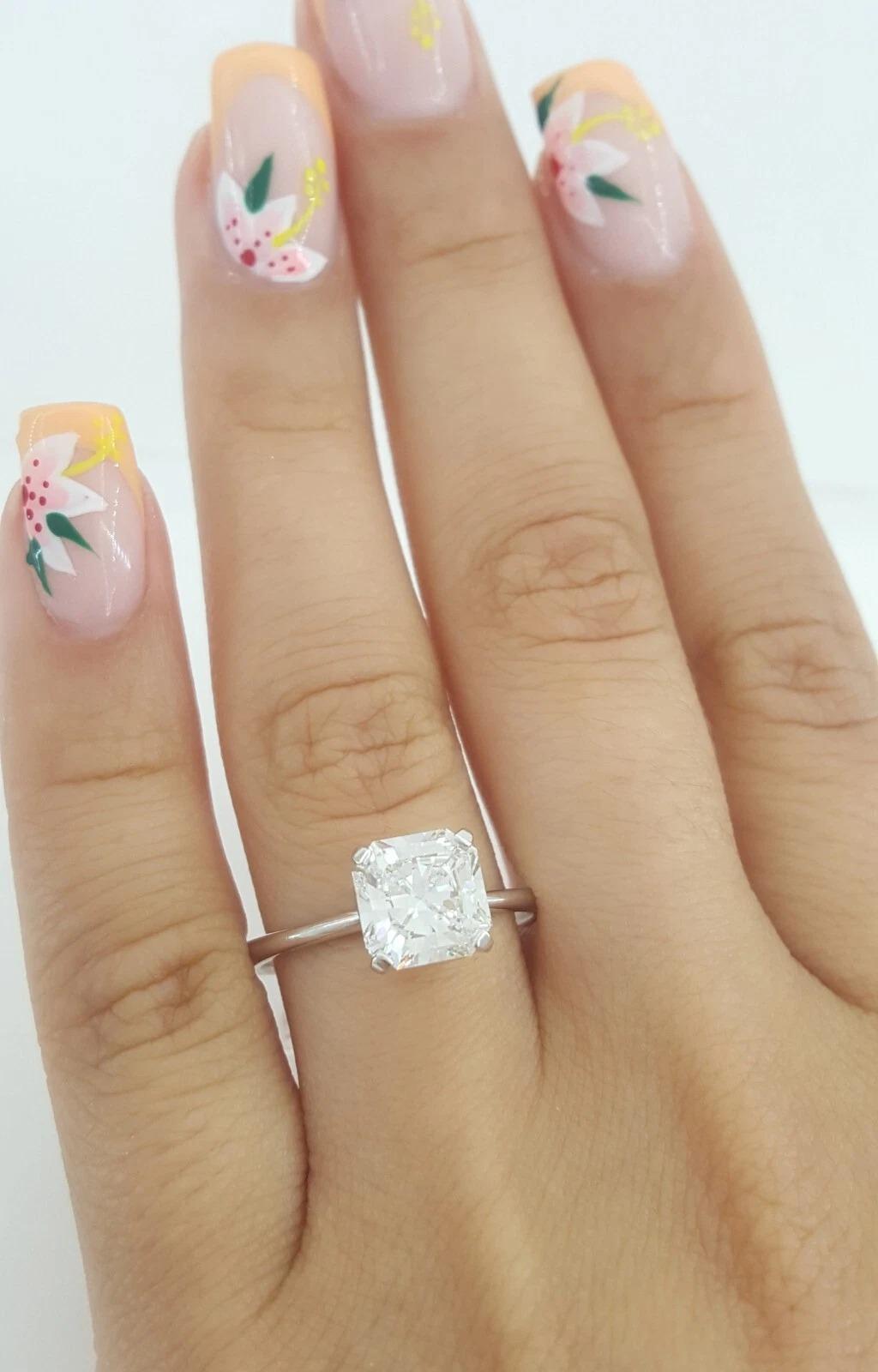 Tiffany & Co. 2.03 Carat True™ Cut Radiant Brilliant Diamond Engagement Ring

Offered here is a stunning Tiffany & Co. engagement ring featuring a 2.03 carat Tiffany True™ Cut Cornered Square Radiant Brilliant Cut Diamond, expertly set in the iconic