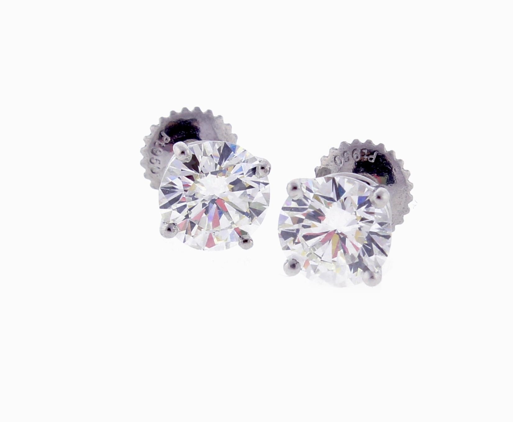 From Tiffany & Co., a pair of diamond screw back stud earrings
♦ Designer: / Hallmarks: Tiffany & Co
♦ Metal: Platinum 
♦ Gem stone: 2 Diamonds = 2.06 carats ,  H color VS1 clarity
♦ Packaging: Tiffany box 
♦ Condition:very good , pre-owned
♦ The