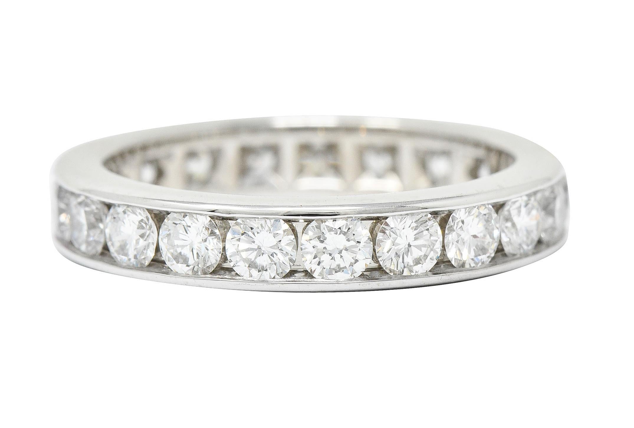 Eternity band ring is channel set fully around by round brilliant cut diamonds

Weighing in total approximately 2.10 carats with F/G color and VS clarity

Stamped PT950 for platinum

Fully signed Tiffany & Co.

Circa: 2000s

Ring Size: 7 & not