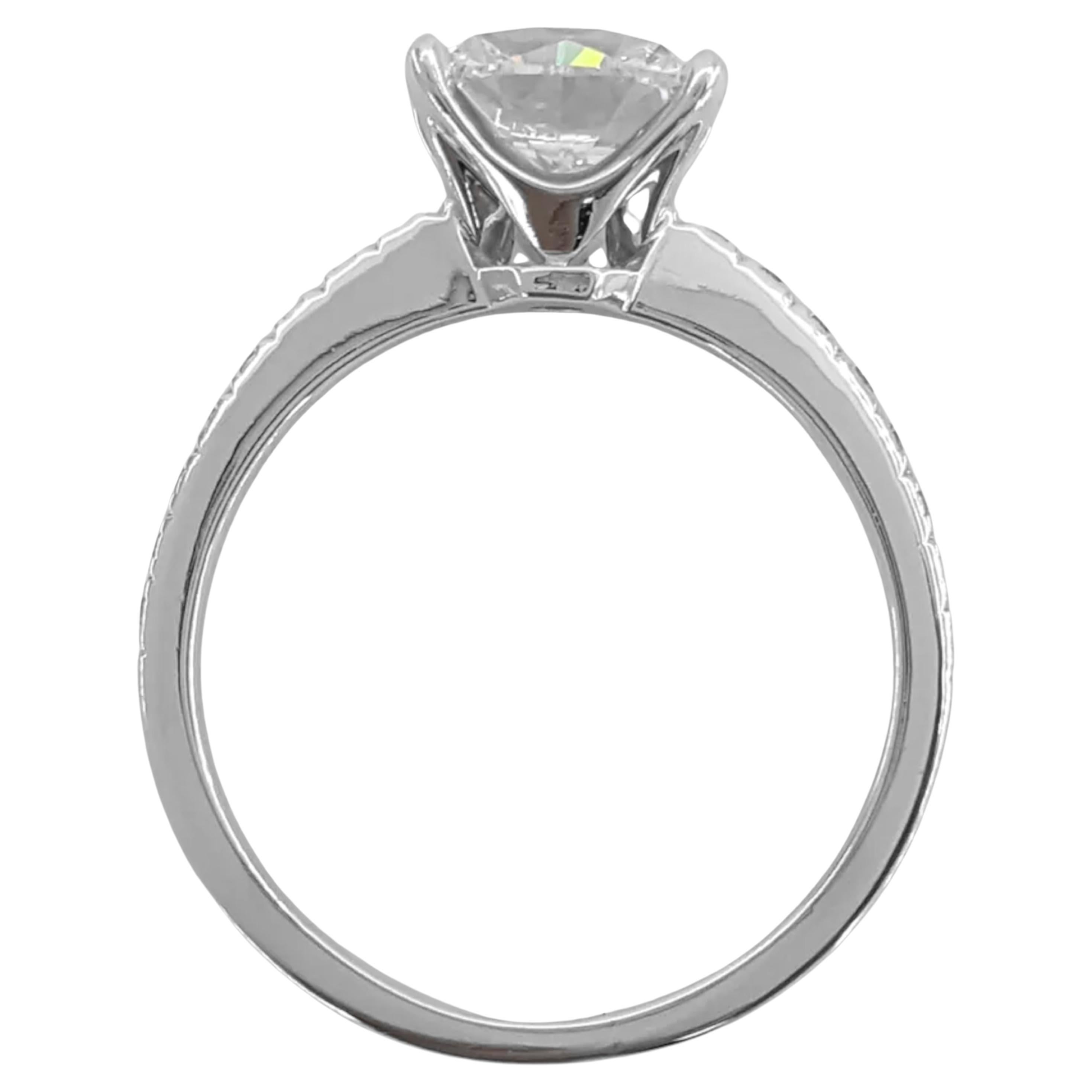 Tiffany & Co. NOVO engagement ring features a total weight of 2.17 ct and is crafted in platinum. The centerpiece is a natural Novo cushion brilliant cut diamond weighing 2.01 ct, graded G in color and VVS1 in clarity. This diamond is known for its