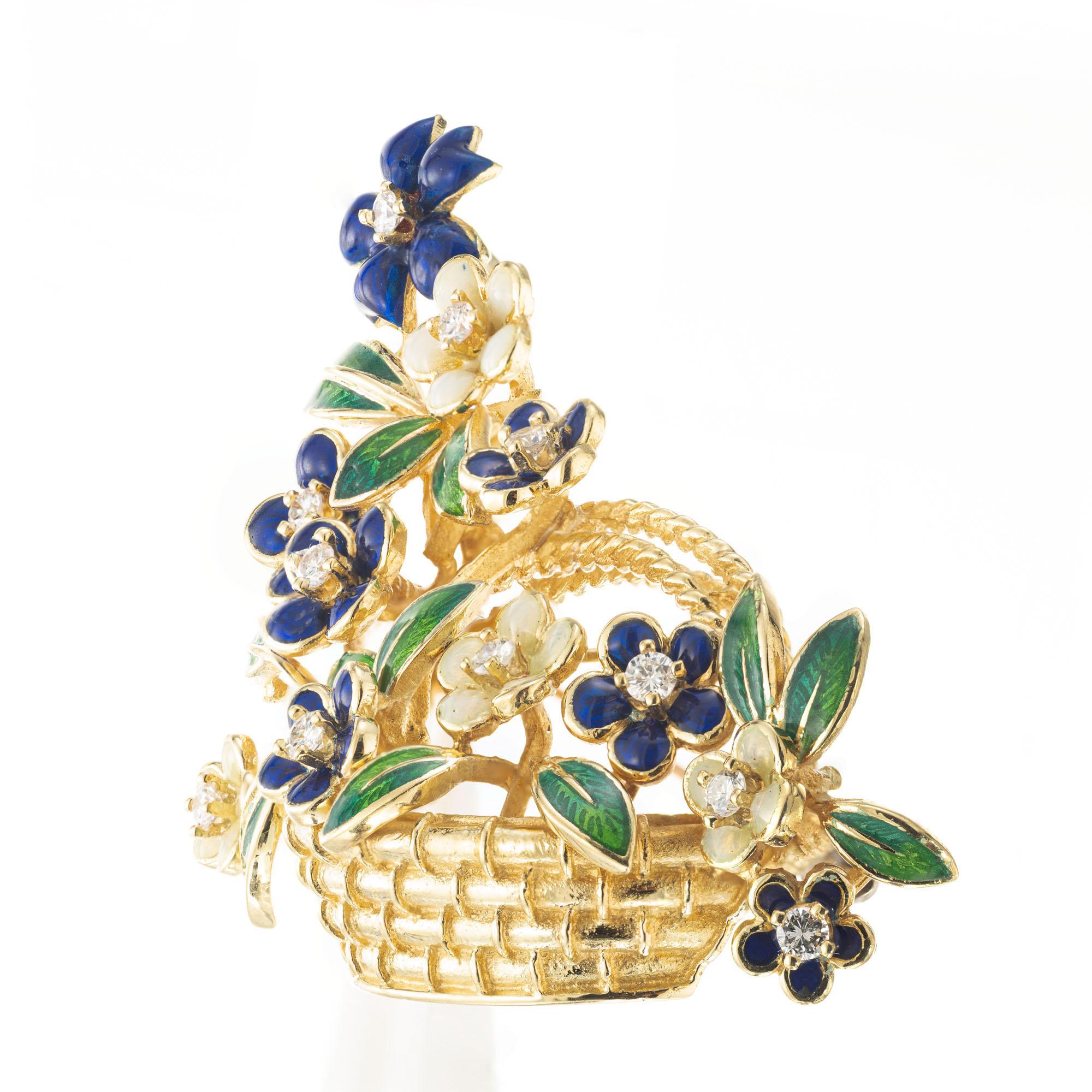 Vintage 1960's Tiffany & Co 18k yellow gold basket flower brooch with blue and green enamel and 11 round accent diamonds. 

11 round brilliant cut diamonds, F-G VS approx. .22cts
Blue green and white enamel
18k yellow gold
Stamped: 18k
Hallmark: