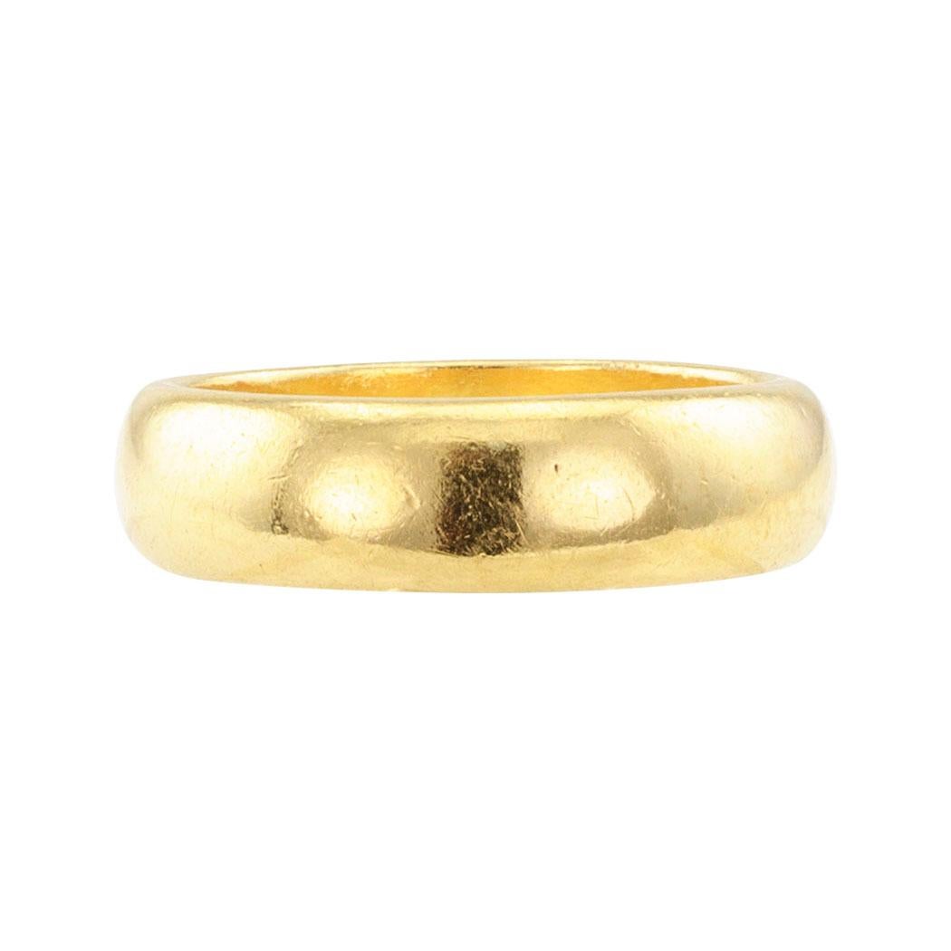Tiffany & Co 22-karat gold antique wedding band circa 1900. The solid ring band design signed Tiffany & Co 22. Very pristine condition with a beautiful patina consistent with age and wear. For over three decades we have been in the business of
