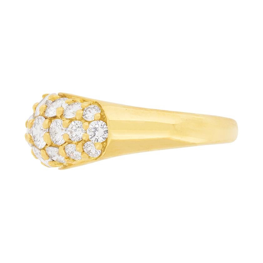 This second hand Tiffany & Co. ring features three rows of sparkling round brilliant diamonds. They graduate in size from the centre and the total weight is 2.20 carat. The diamonds are top quality, with an estimated grade of F to G in colour and VS