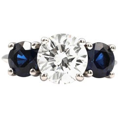Tiffany & Co. 2.22 Carat Round Brillant Solitaire Ring with Two Sapphires