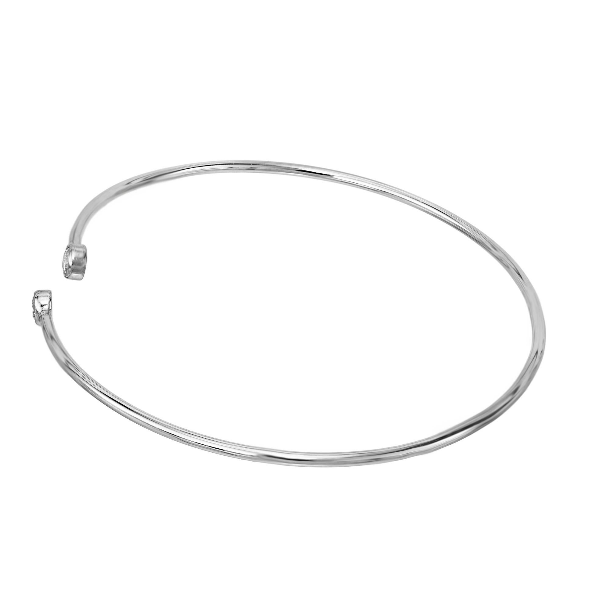 From the Tiffany & CO. Peretti hoop collection. Platinum by the yard style diamond bracelet. The bracelet is adorned with tow bezel set  shimmering .23 carat diamonds, perfectly set to catch the light with every movement, much like a personal