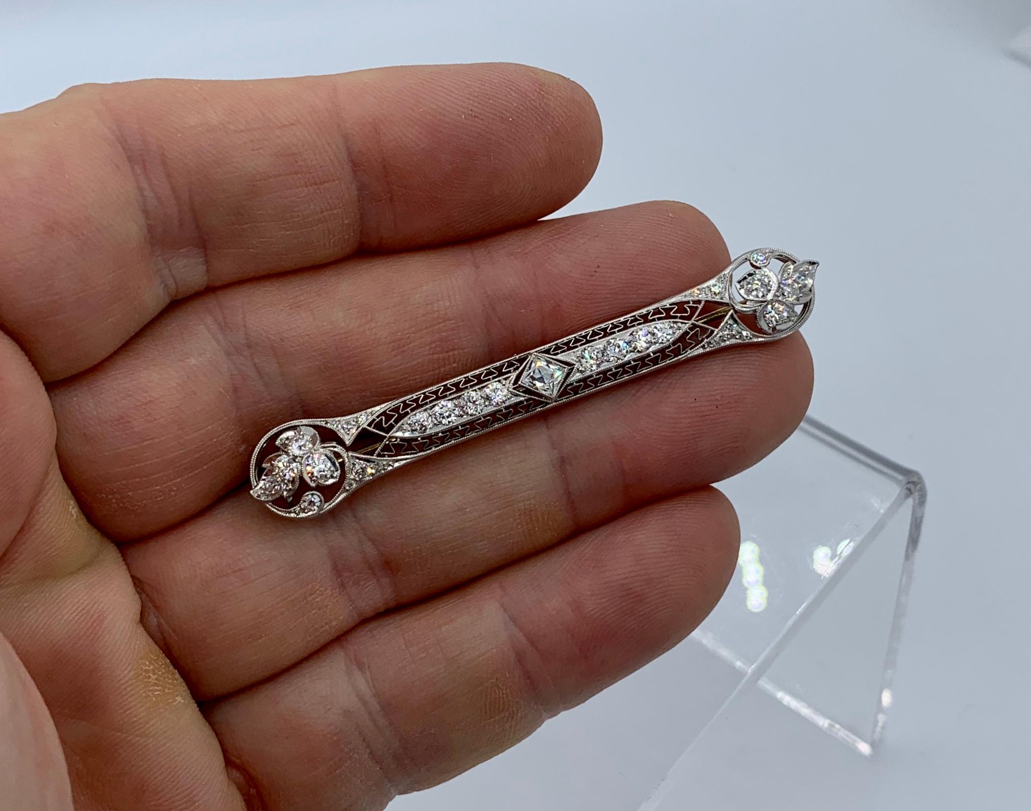 This is an extraordinary Diamond Platinum Tiffany & Co. Edwardian - Art Deco Brooch Pin with approximately 2.5 Carats of magnificent Old Mine Cut Tiffany Diamonds set in Platinum in an open work scroll and leaf motif design of the highest quality.  