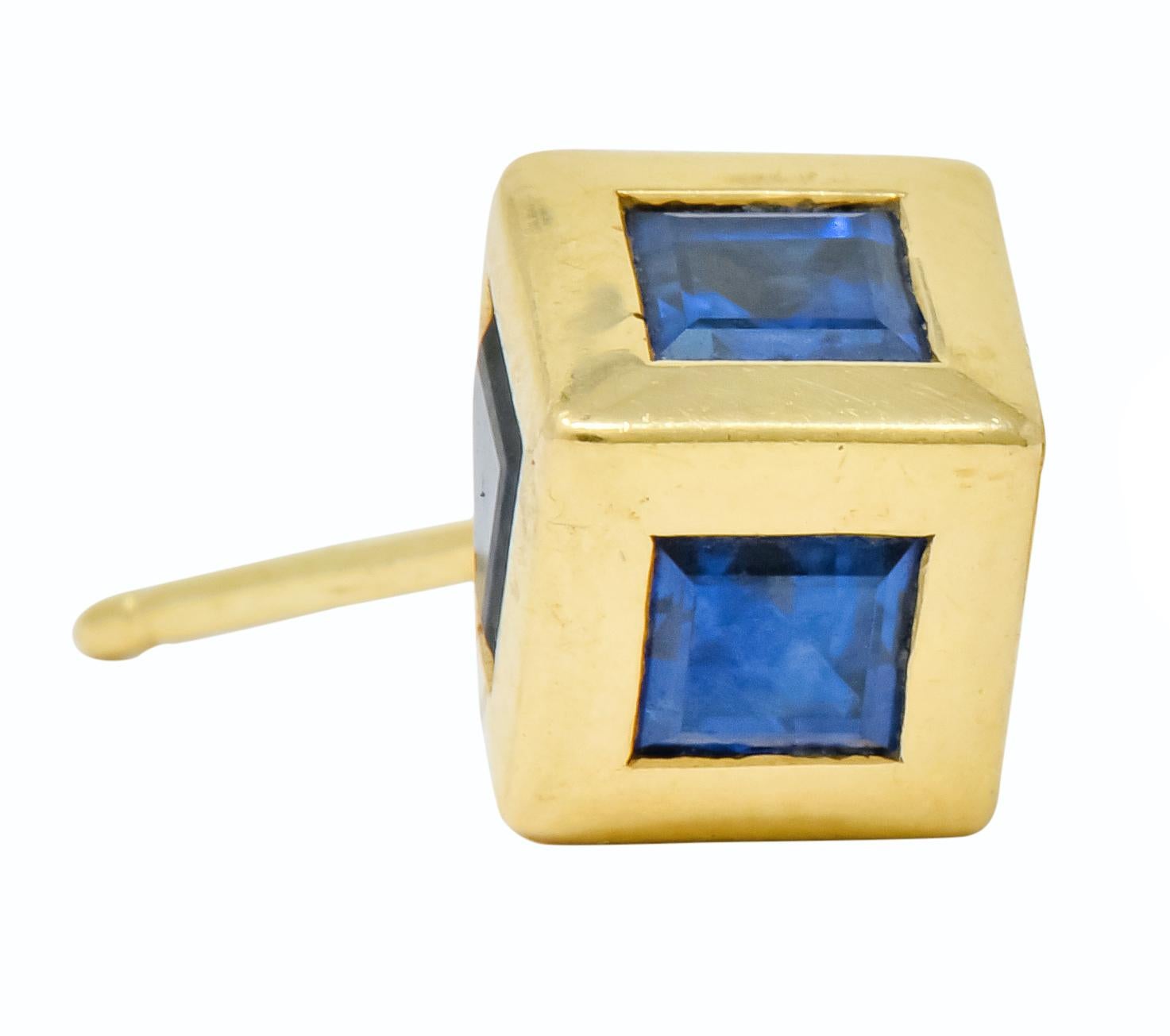 Featuring bezel set calibré cut sapphires and channel set princess cut diamonds in a multi dimensional “tumbling block” design

Diamonds weigh approximately 0.45 carat total, F/G color and VS clarity

Sapphires weigh approximately 2.10 carat total,