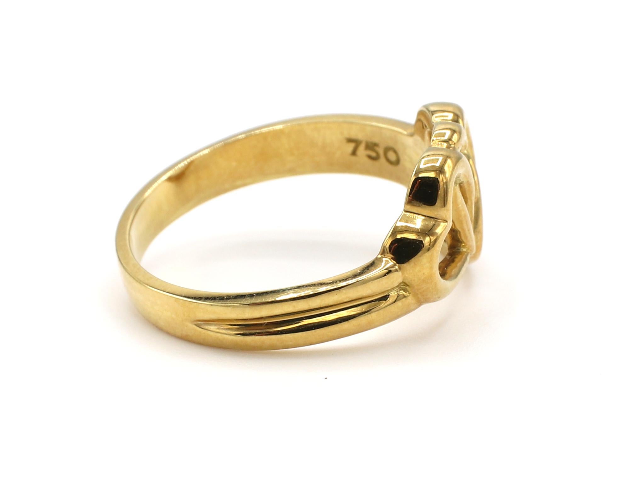 Tiffany & Co. 3 Heart 18 Karat Yellow Gold Ring 
Metal: 18k yellow gold
Weight: 4.10 grams
Size: 6.5 (US)
Width: 2.5 - 8mm
Signed: Tiffany & Co. 750
