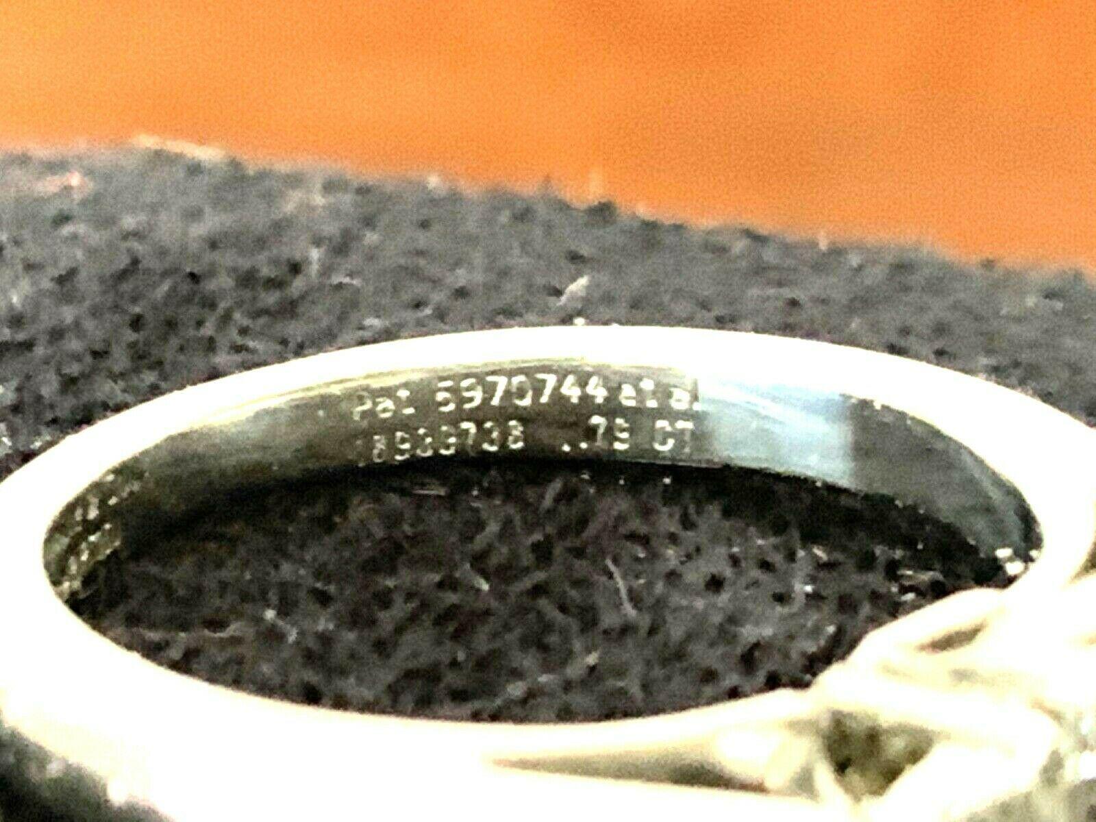 Tiffany & Co. 3-Stone Diamond Engagement Ring .79 Carat F VVS2 6