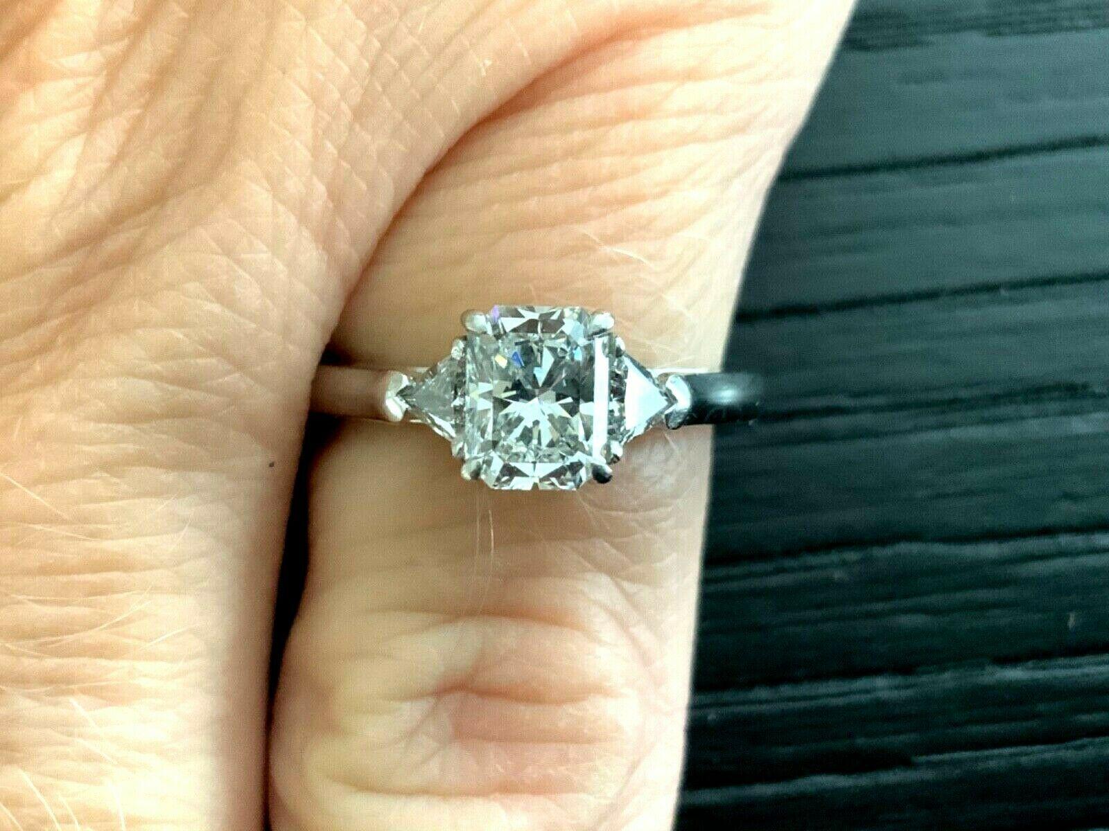 Being offered for your consideration is a stunning 3 stone Modified Rectangular Cushion Cut (Lucida) Diamond engagement ring or anniversary ring.  This ring can be paired with another or worn as a cocktail ring or anniversary band - it is extremely