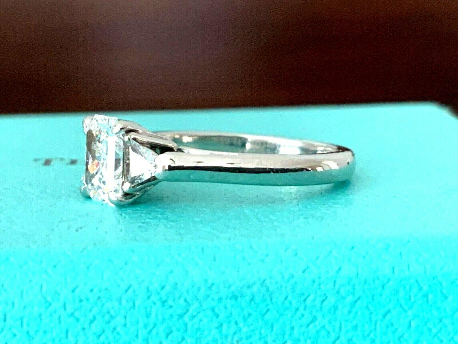 Tiffany & Co. 3-Stone Diamond Engagement Ring .79 Carat F VVS2 4