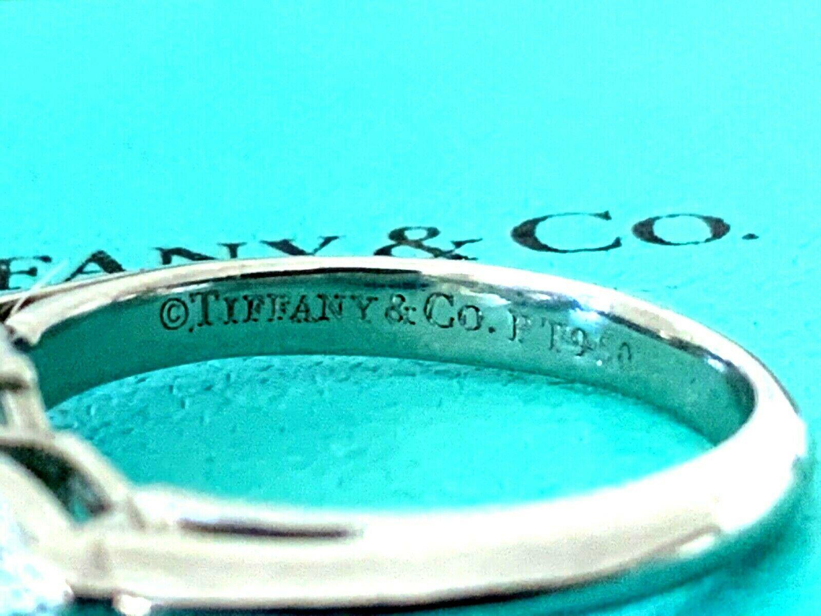 Tiffany & Co. 3-Stone Round and Pear Diamond Engagement Ring .77 Carat G VS2 4