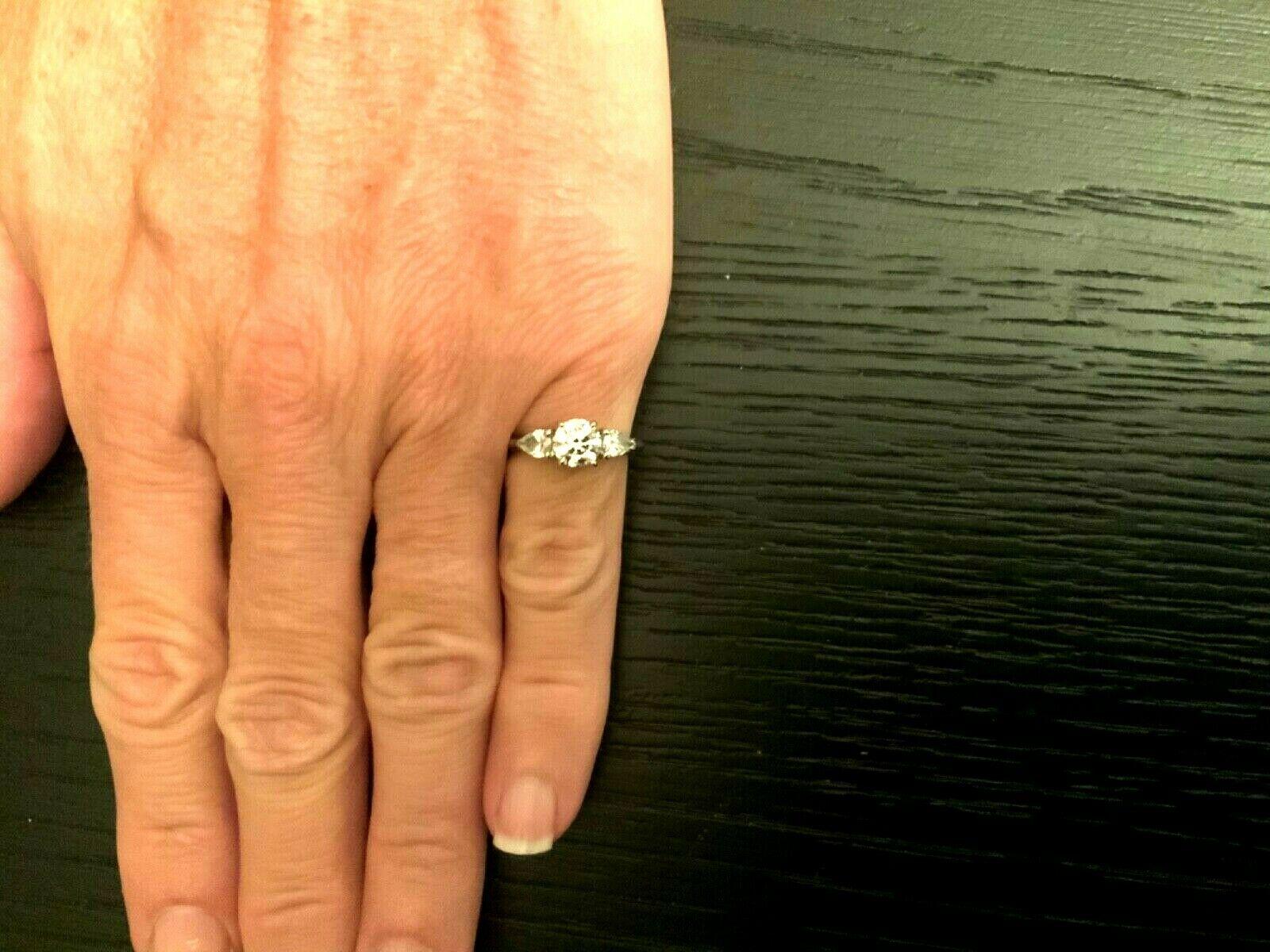 Tiffany & Co. 3-Stone Round and Pear Diamond Engagement Ring .77 Carat G VS2 1