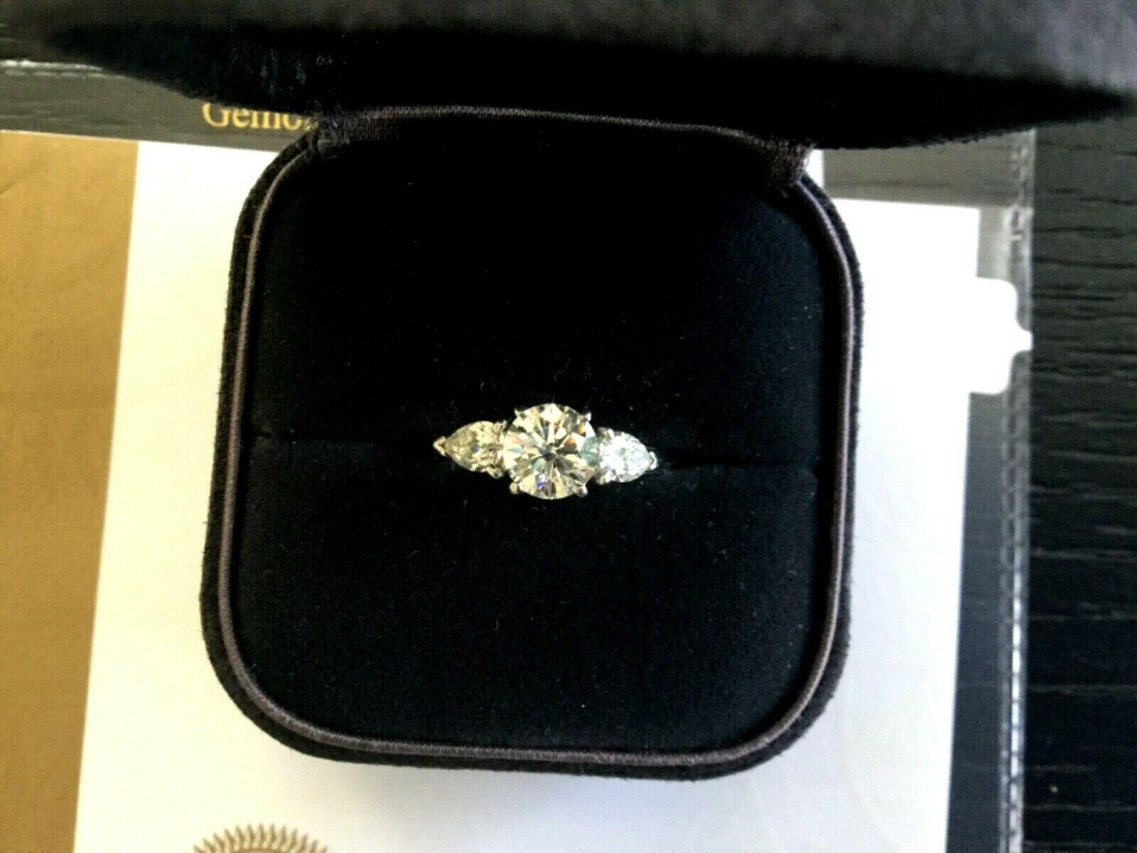 Women's Tiffany & Co. 3-Stone Round and Pear Diamond Engagement Ring F VS1 For Sale