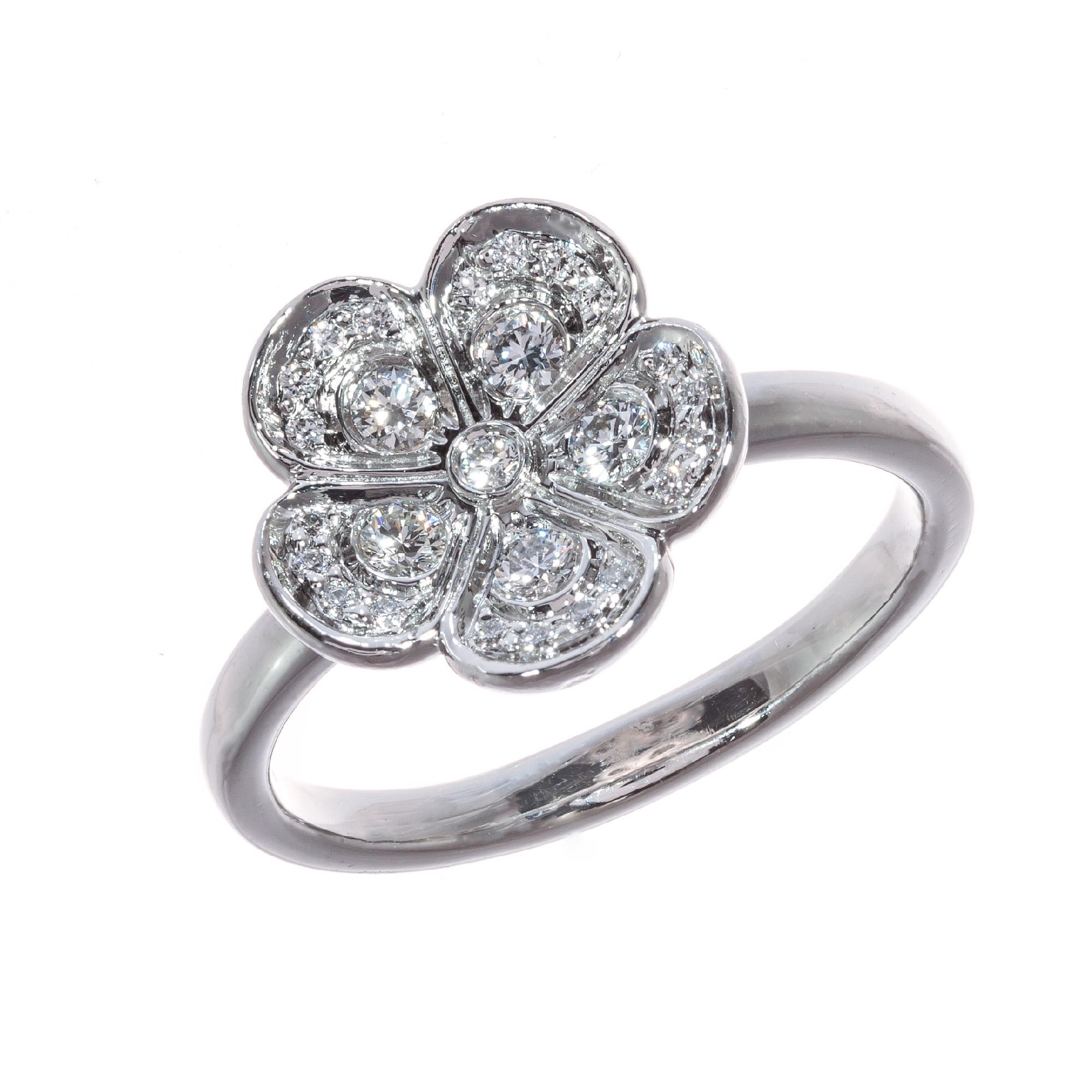Tiffany & Co Enchanted garden diamond flower platinum ring. 26 round brilliant cut diamonds set in a platinum setting. 

26 round brilliant cut F-G VS diamonds, Approximate .30cts
Size 6 ½ and sizable 
Platinum 
Stamped: PT 950
Hallmark: Tiffany &