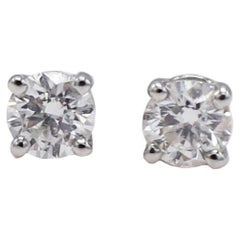 Tiffany & Co. .30 Carat Platinum Solitaire Diamond Stud Earrings
