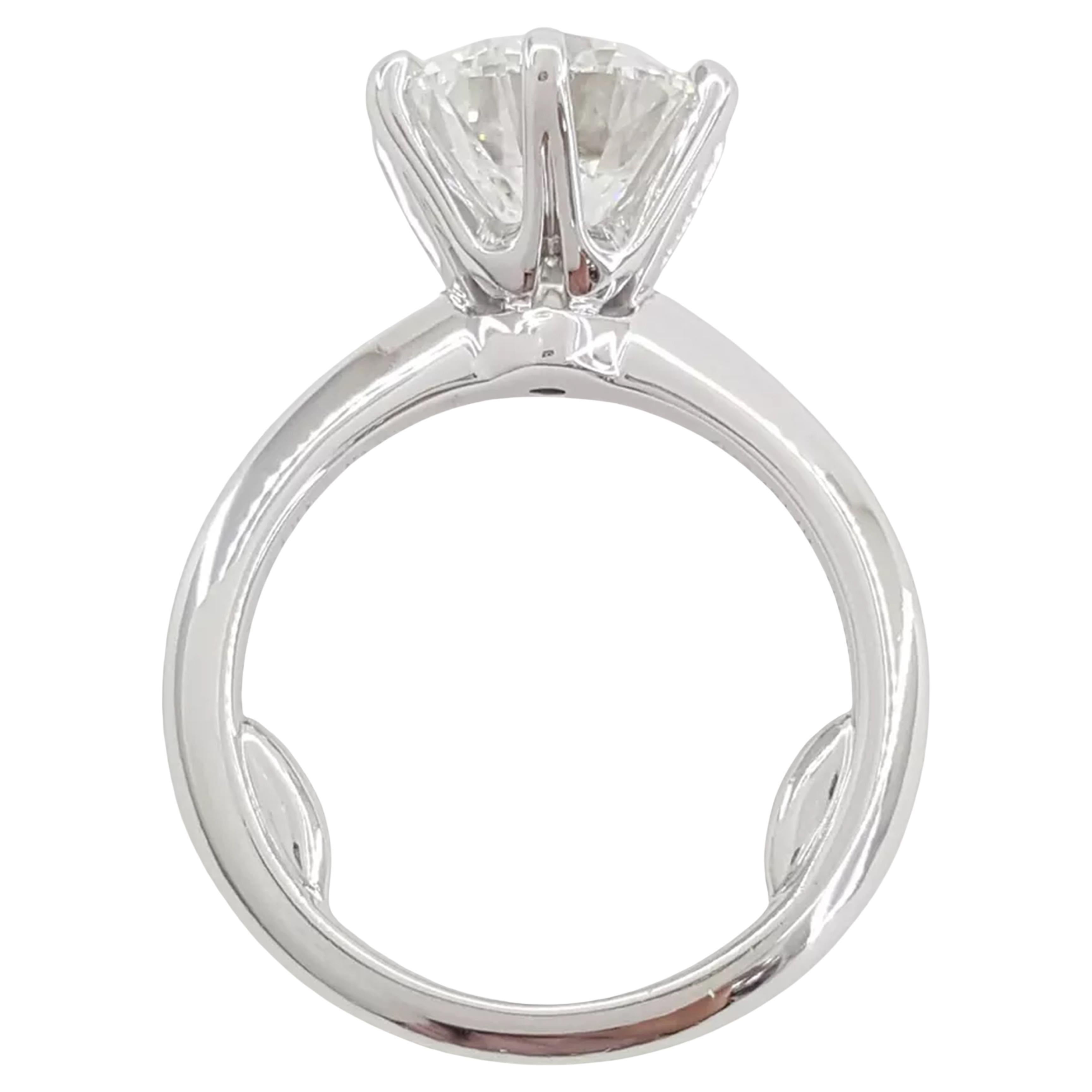Tiffany & Co. 3.08 ct Platinum Round Brilliant Cut Diamond Solitaire Engagement Ring is a breathtaking and luxurious piece. The ring weighs 6.9 grams and is a size 5.5, with the option to resize to most finger sizes. It features a stunning natural