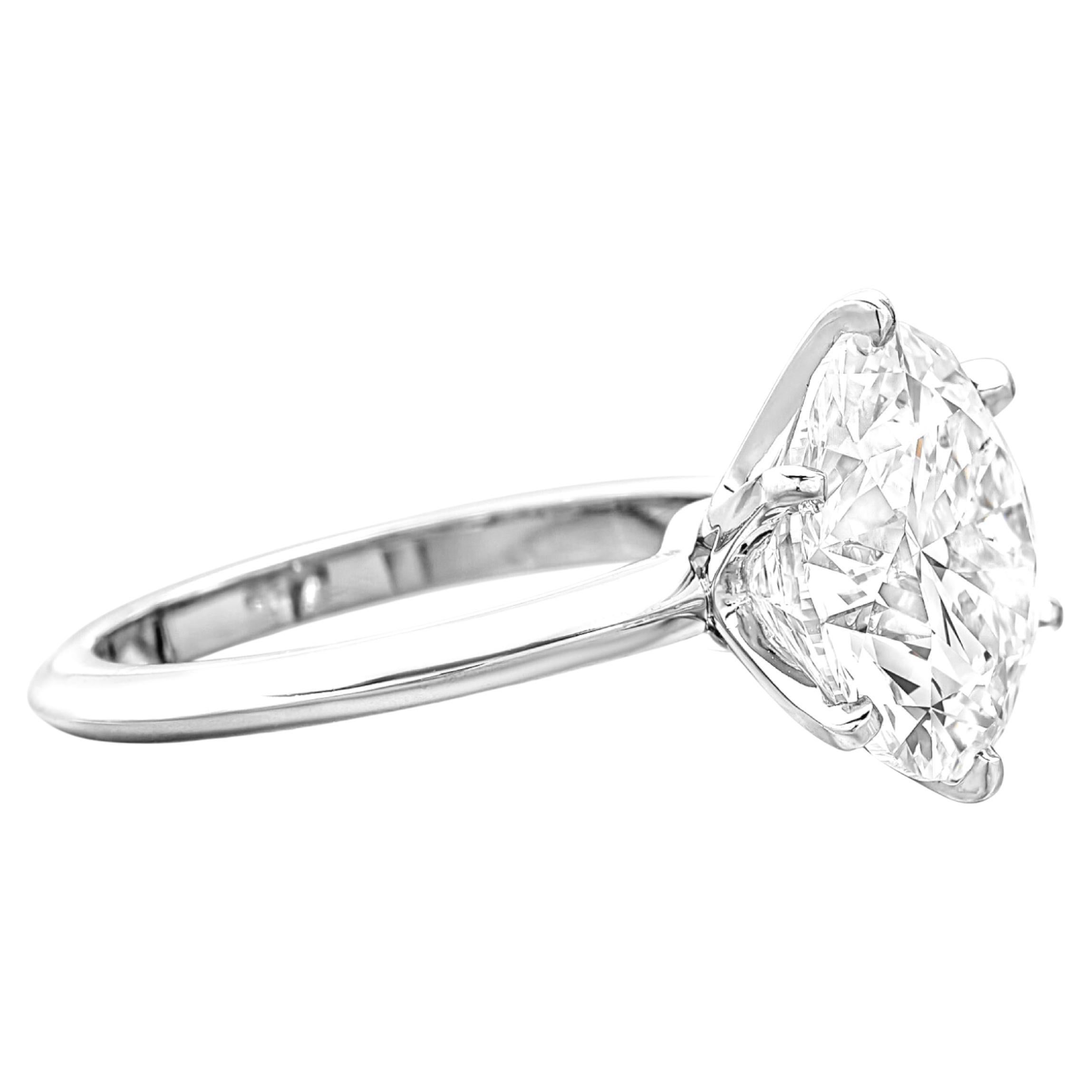  Tiffany & Co. 3.08 ct Platinum Round Brilliant Cut Diamond Solitaire Engagement Ring. This exquisite piece features a center diamond weighing 3.08 ct with a G color grade and VS1 clarity, showcasing an Ideal Cut and faint fluorescence. The