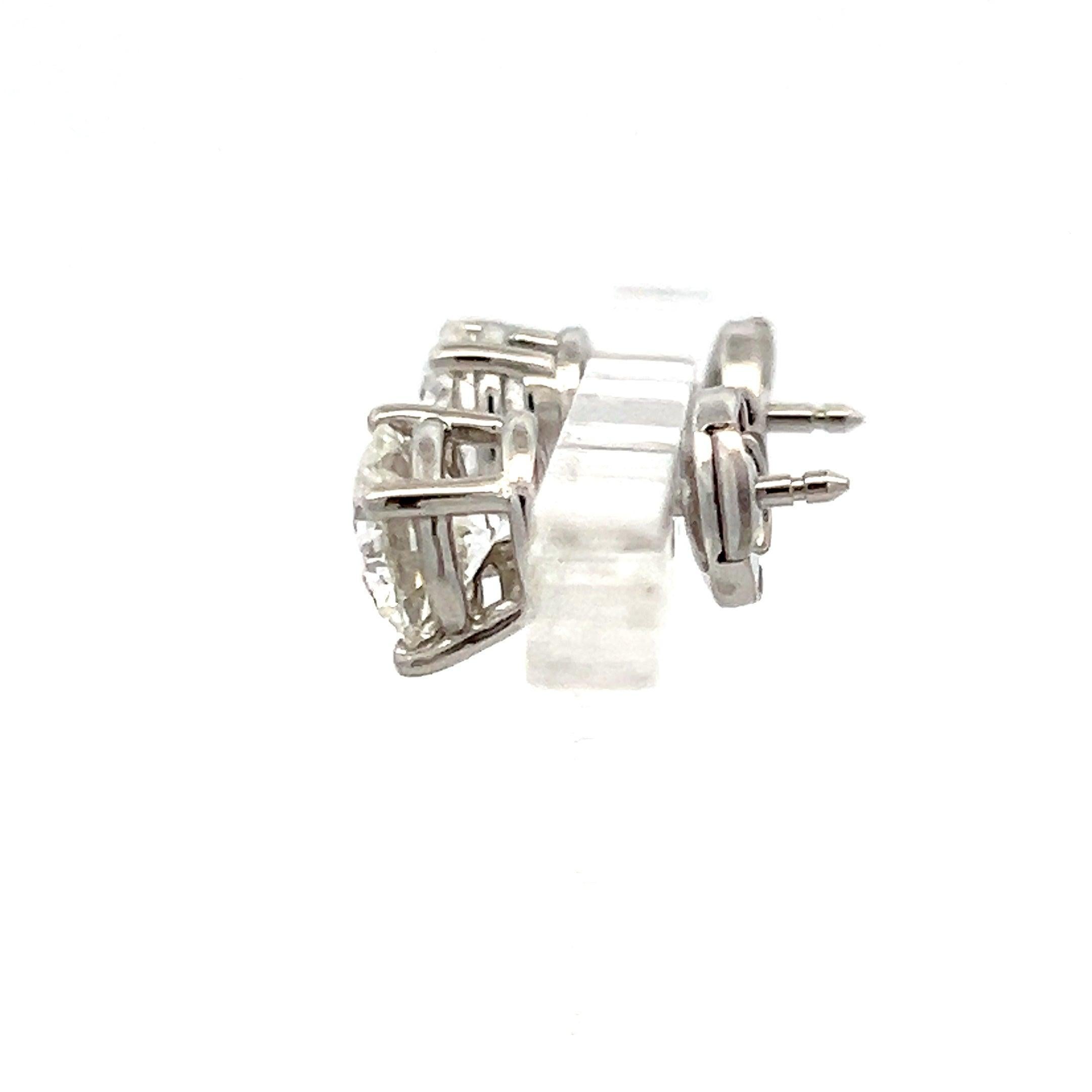 Tiffany & Co 3.12 Carat H-VS1 Diamonds Platinum Stud Earrings In Good Condition For Sale In New York, NY