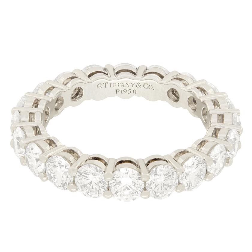 A superb full eternity ring from Tiffany & Co 'Embrace' collection. This gorgeous ring has twenty round brilliant cut diamonds all claw set in platinum and measures 3.7mm wide. It has a total diamond weight of 3.18 carat, all matching E-F/VVS in