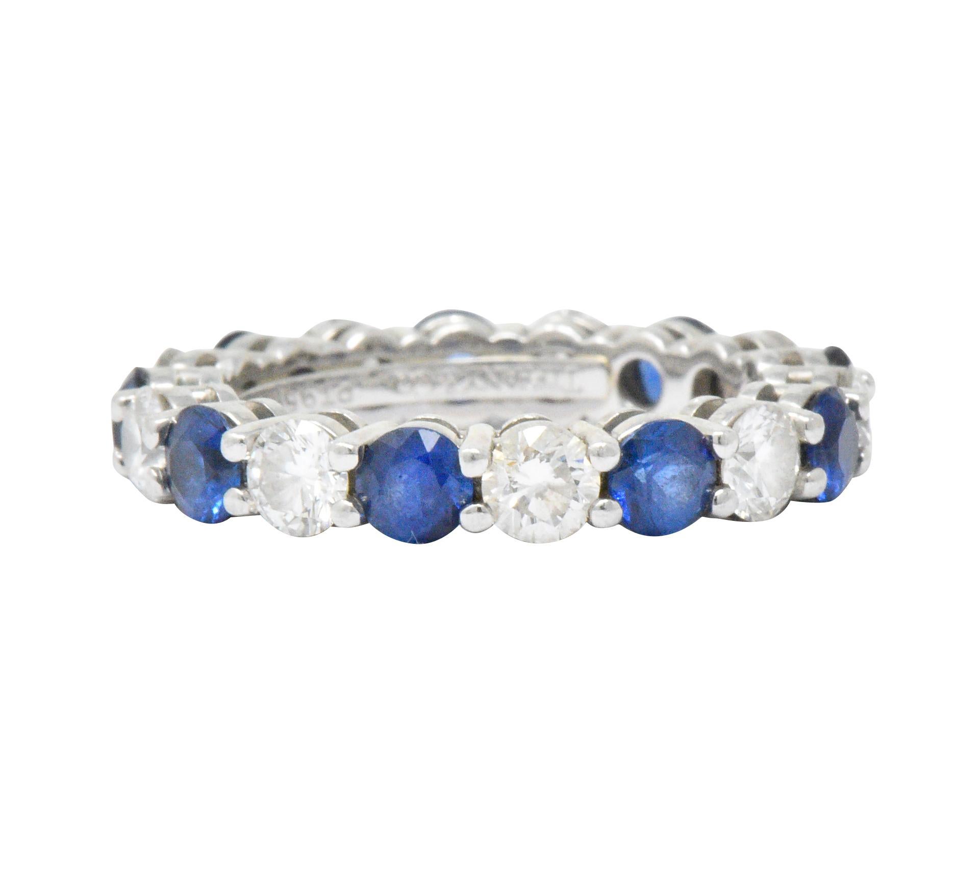 Featuring approximately 1.35 CTW of (9) round brilliant cut diamonds F-G color and VS clarity

Alternating (9) bright blue natural sapphires weighing 1.89 CTW

From the Embrace Collection 

Fully signed Tiffany & Co. PT950

Retail: $9,025

Size: 5