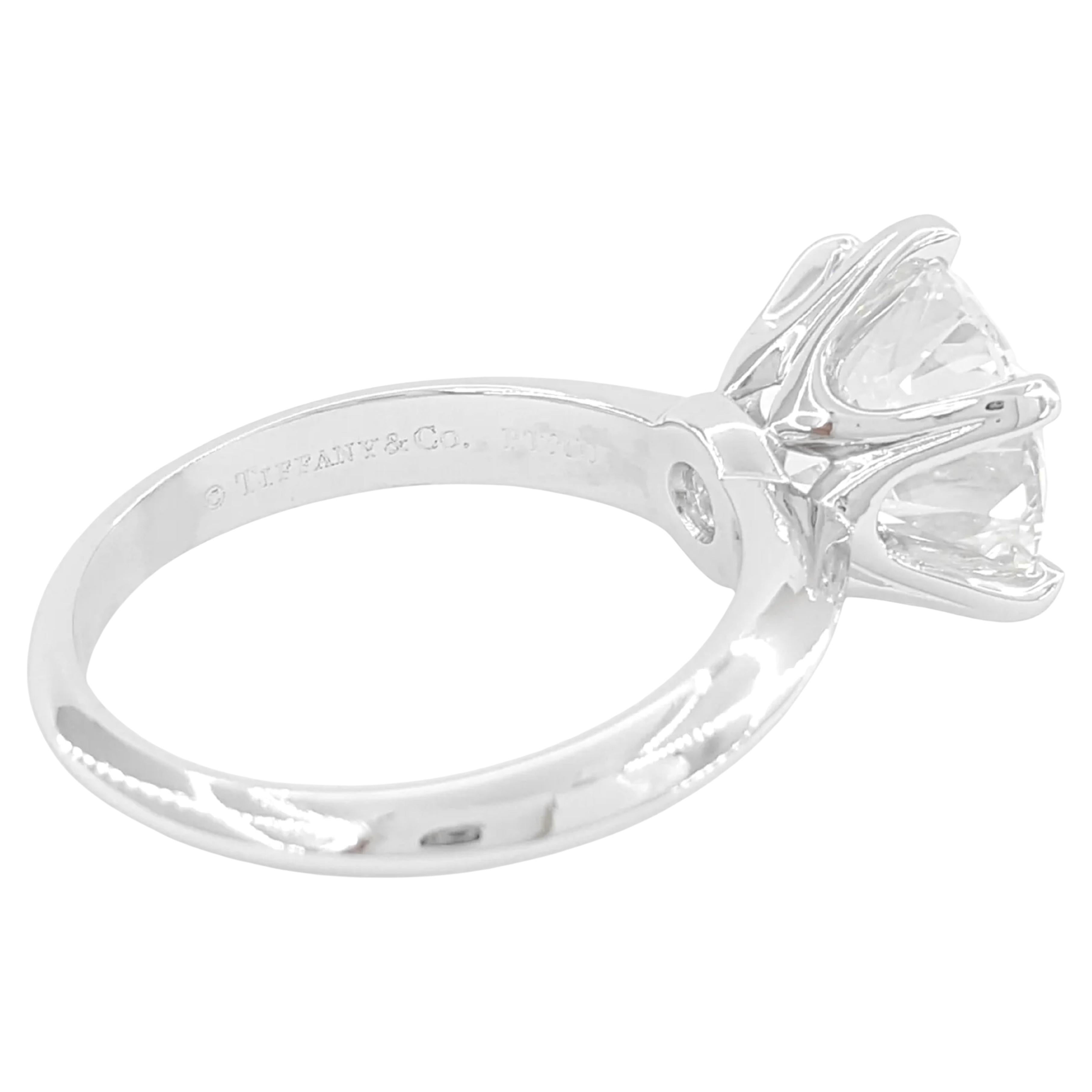 Tiffany & Co. 3.78 ct Platinum Round Brilliant Cut Diamond Solitaire Engagement Ring is a breathtaking and luxurious piece. The ring weighs 6.6 grams and is a size 5.75, with the option to resize to most finger sizes. It features a stunning natural