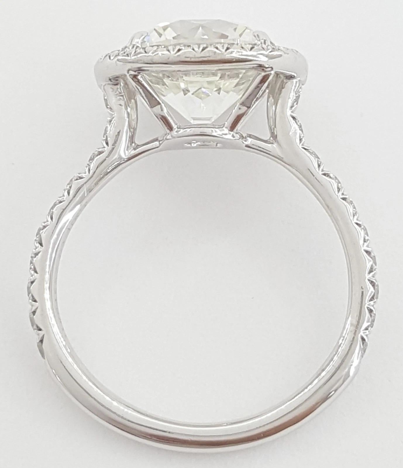 Tiffany & Co. 3.82 Carat Platinum Soleste Diamond Halo Engagement Ring In Excellent Condition For Sale In Chicago, IL