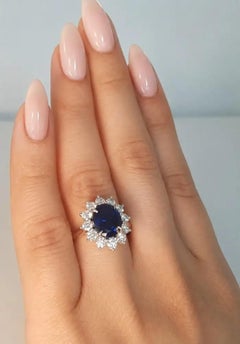 Tiffany & Co. 3.90 Carat No Heat Blue Sapphire Diamond Halo Ring in Platinum