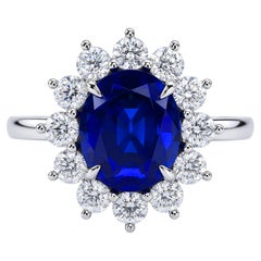 Tiffany & Co. 3.90 Carat No Heat Blue Sapphire Diamond Halo Ring in Platinum