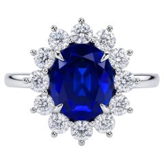 Tiffany & Co. 3.90 Carat No Heat Blue Sapphire Diamond Halo Ring in Platinum