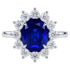 Tiffany & Co. 3.90 Carat No Heat Blue Sapphire Diamond Halo Ring in Platinum